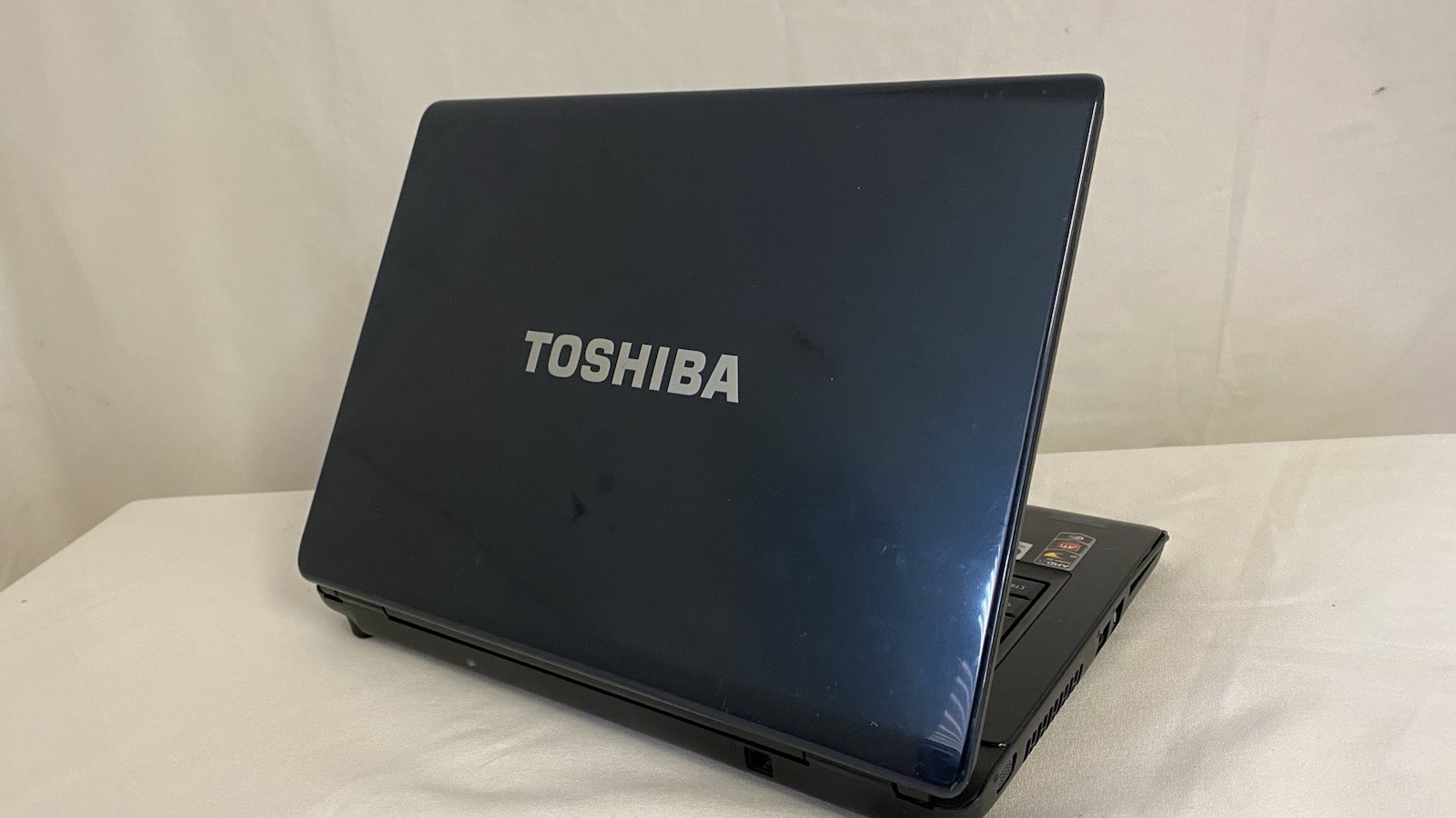 Toshiba Satellite L305D-S5934 AMD Turion X2 RM-70 2GHz 1 GB NO CHARGER. Works!