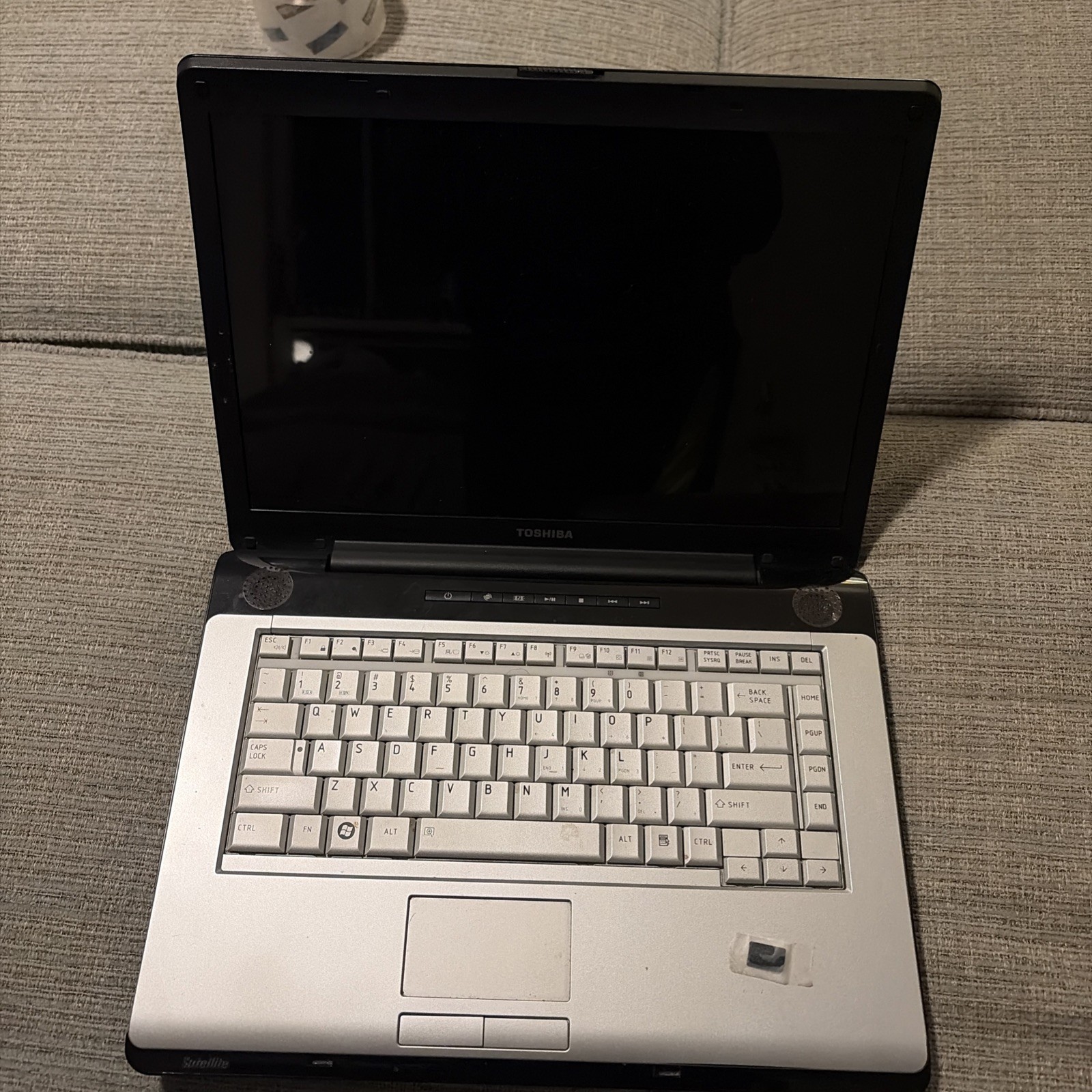 Toshiba Satellite A215-S4747 Laptop AMD Turion 64 x2 894MB Ram No HDD or Charger