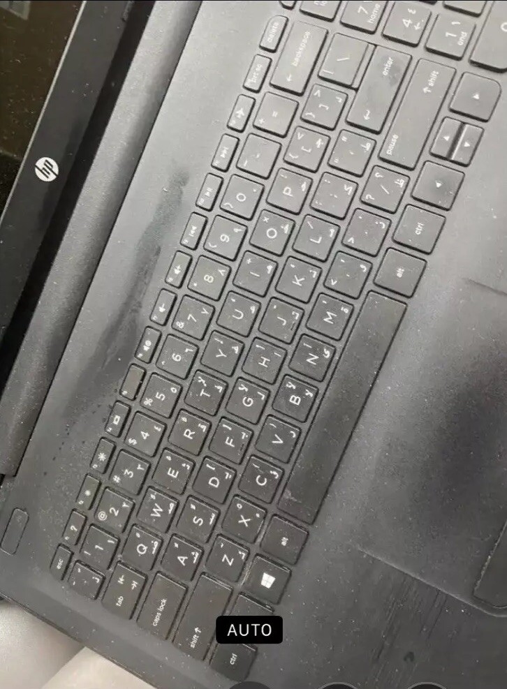 Black HP laptop (only Comes With One Part Of The Charger )