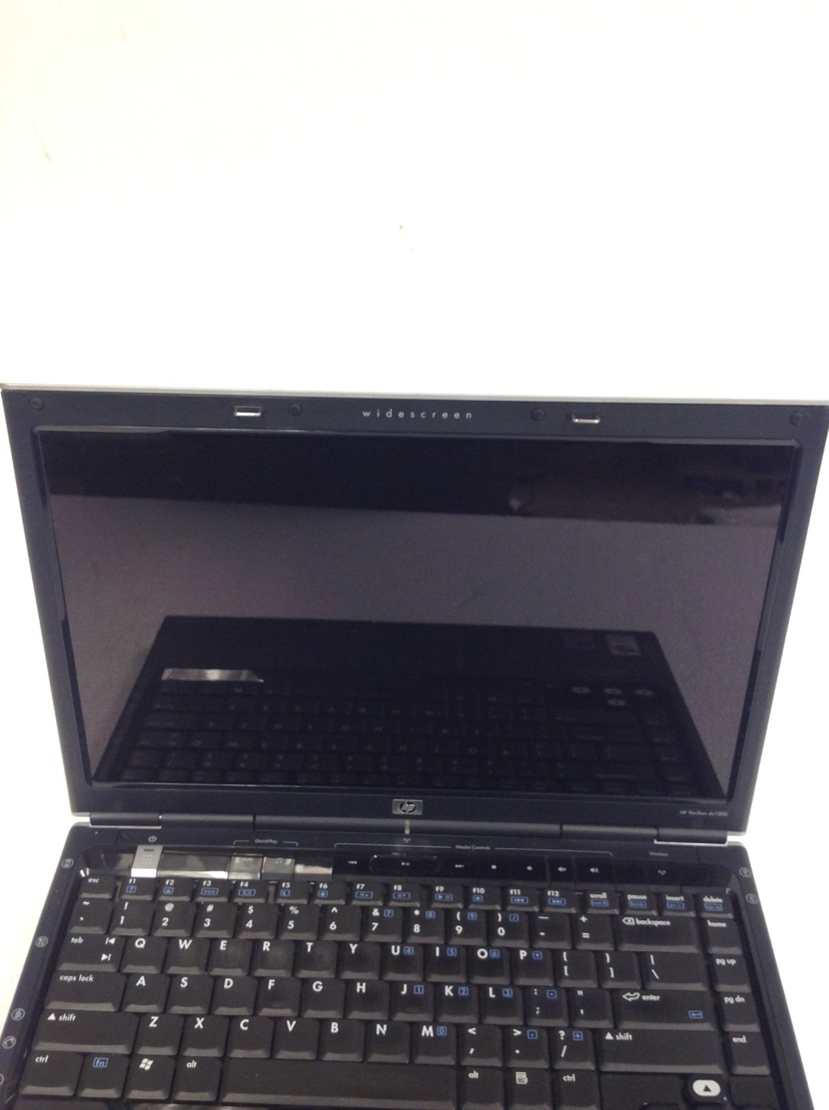 HP Pavilion DV1000 Pentium M 1.50GHz 14″ Laptop w/2GB RAM, DVDRW, Adapter, No HD
