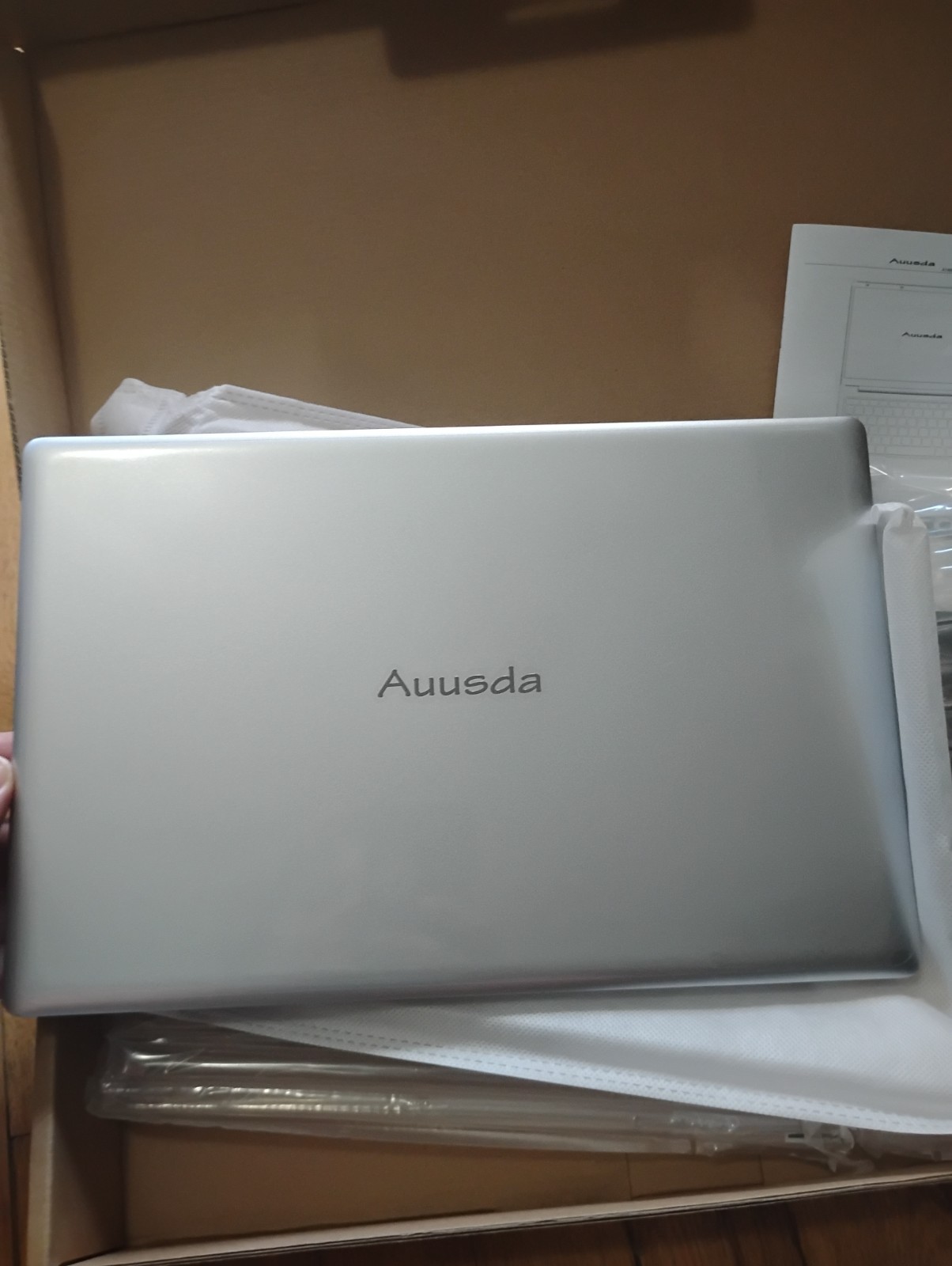 Silver Aussda 14.1″ laptop. NEW. Windows 11. 512 GB, Celeron. LCD screen
