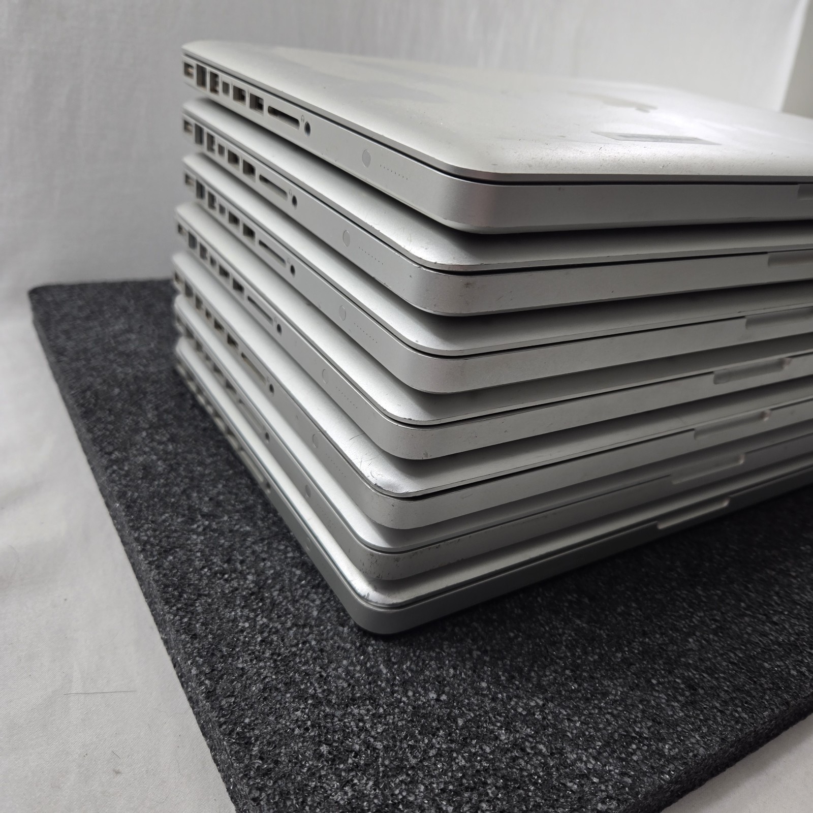Lot of (7) Apple MacBook Pro A1278 intel i5 2.3 & 2.5 – Mixed Ram & HDD – PARTS
