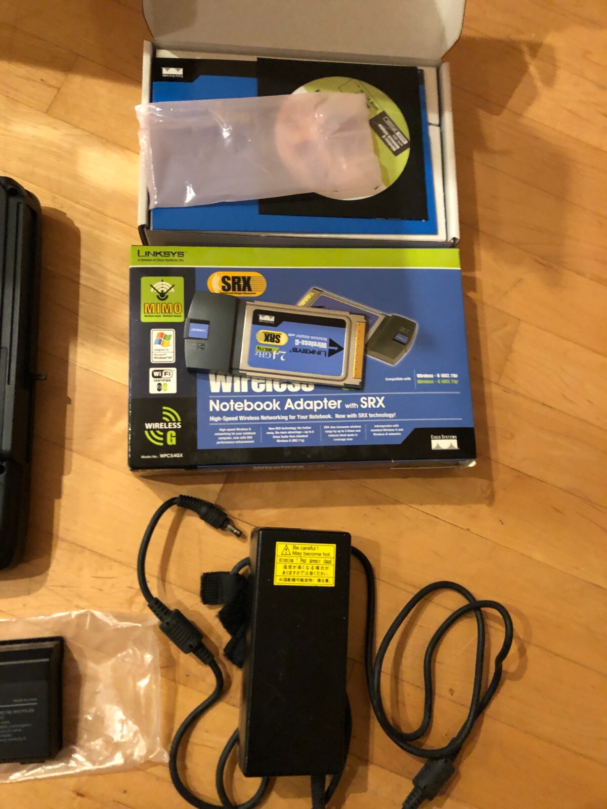 Toshiba Satellite A75-S125 laptop with Cisco-Linksys SRX400 wireless-G adapter