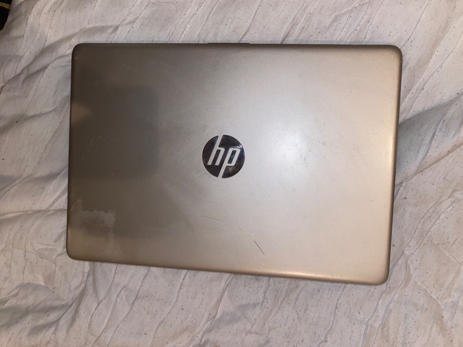 Gently used HP 14″ Laptop in Pale Gold
