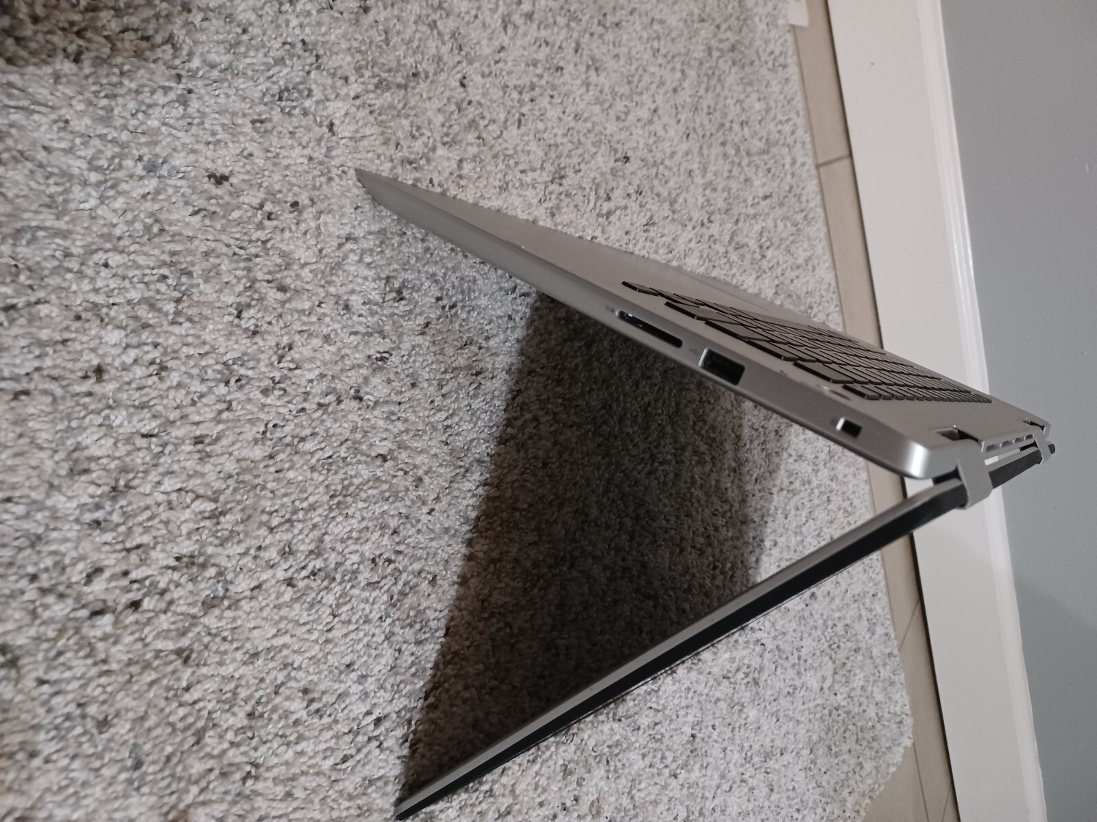 Silver laptop i5 10th generation hp dell . Used but unused condtion