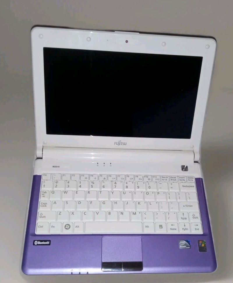 Fujitsu M2010 Series Purple Windows 7 Starter Netbook Laptop Computer