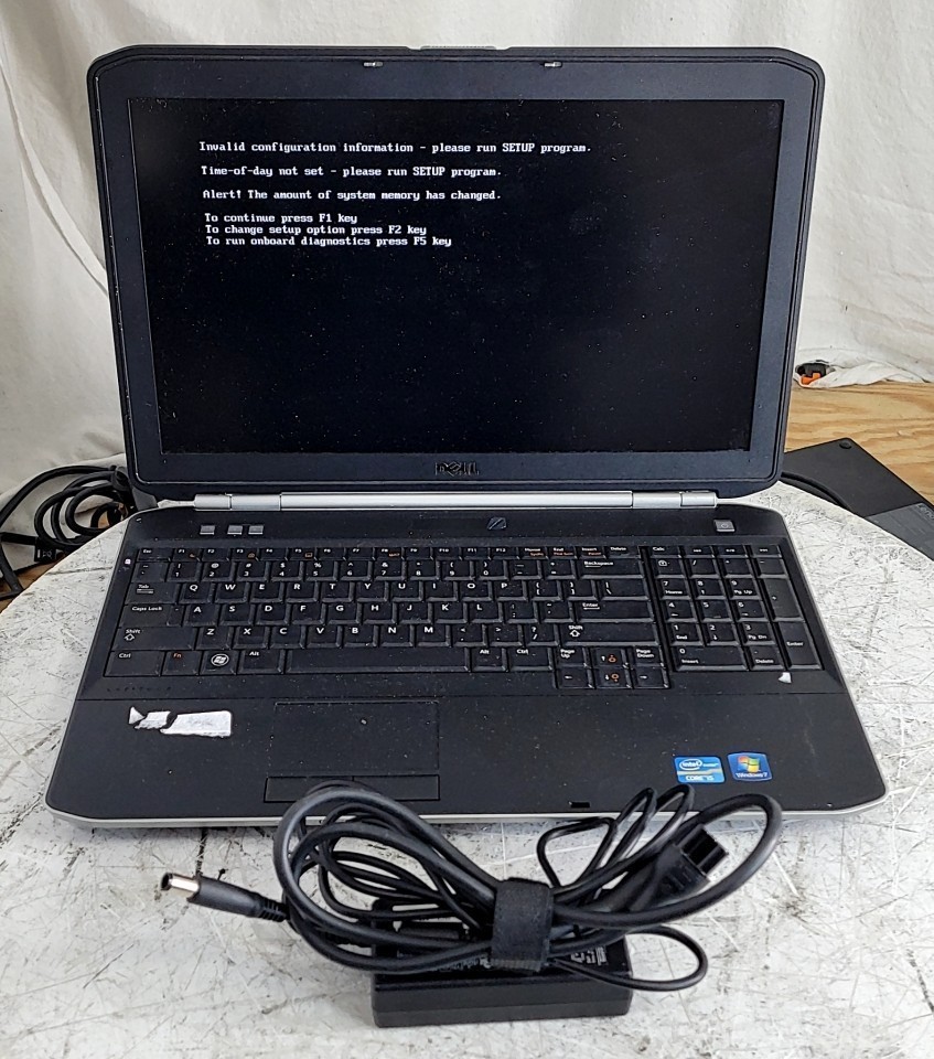 DELL LATITUDE E5520 Laptop Core I5-2520M 4GB 1TB SEE NOTES