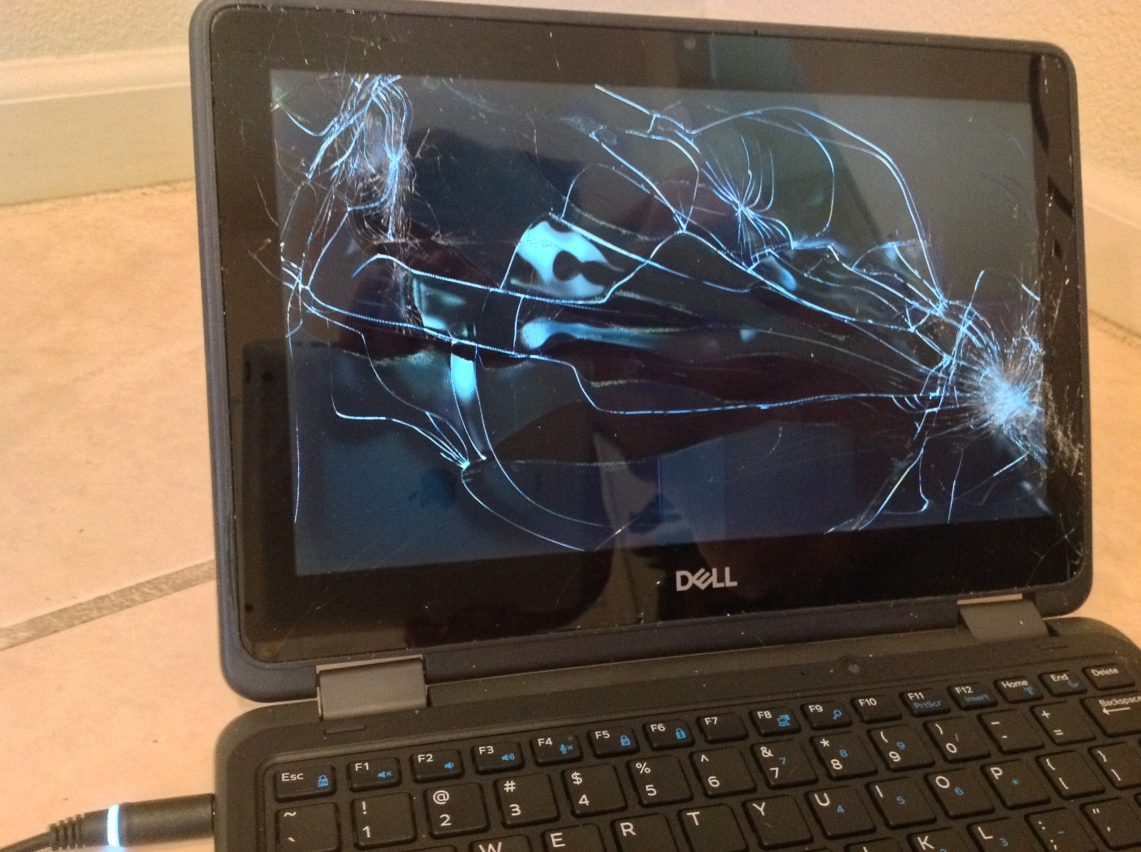 Dell P26T Laptop with Charger for Parts or Fix
