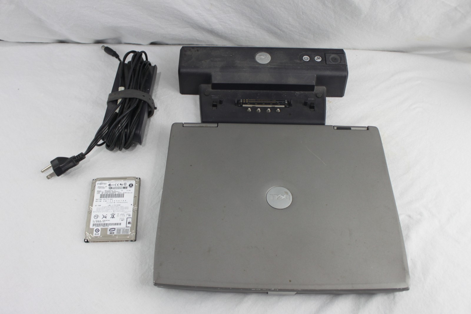 Dell Latitude D600 Laptop + Docking Station + Extra 60GB HDD – Tested Working