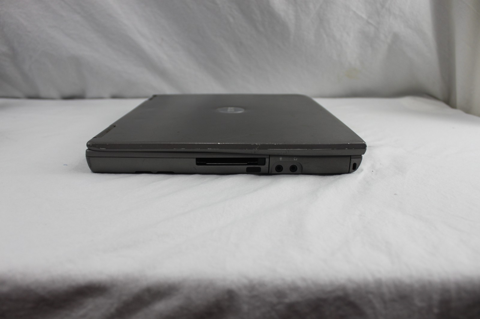 Dell Latitude D600 Laptop + Docking Station + Extra 60GB HDD – Tested Working