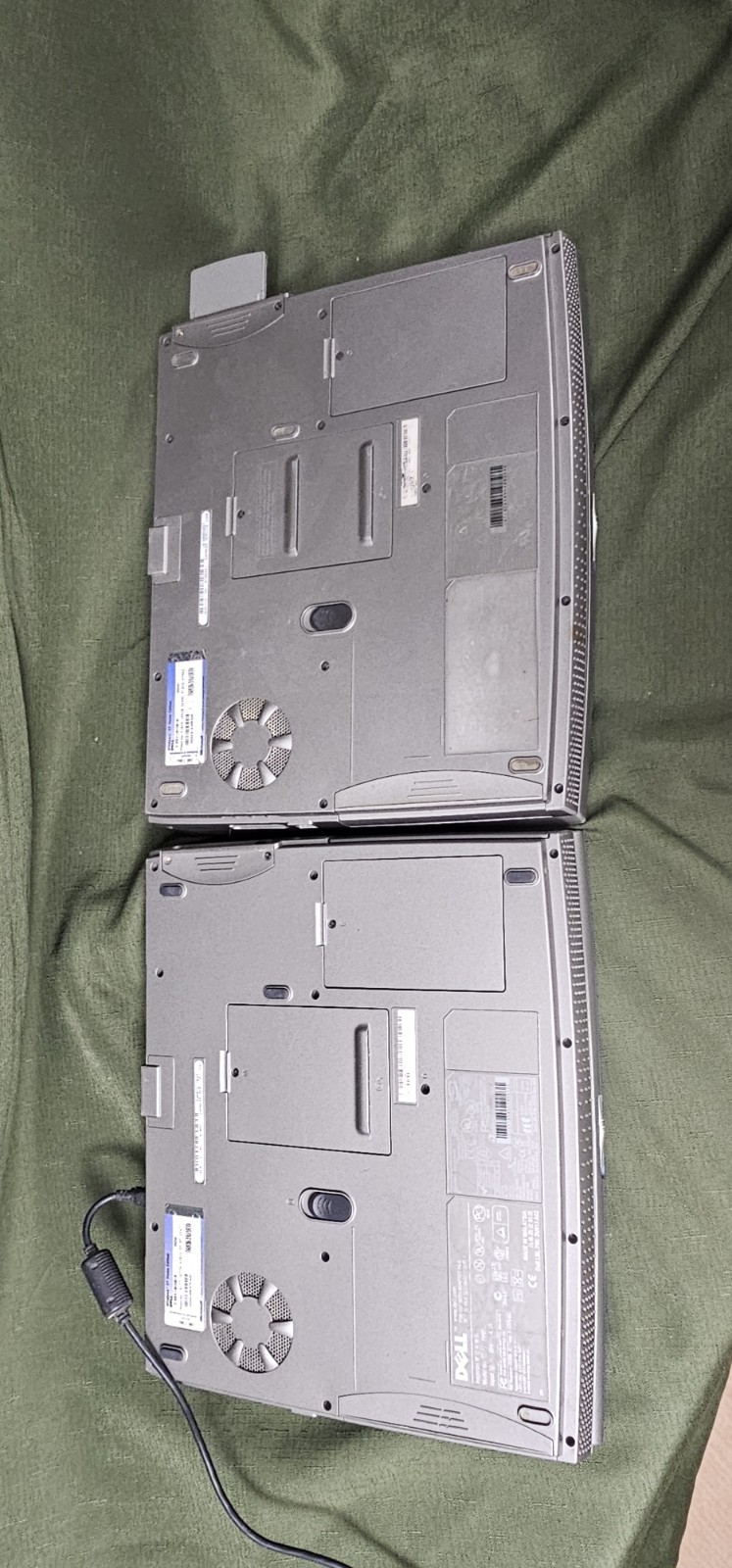 (2) DELL Inspiron 1100 Laptops 1 good battery, no hard drive, both work lot of 2