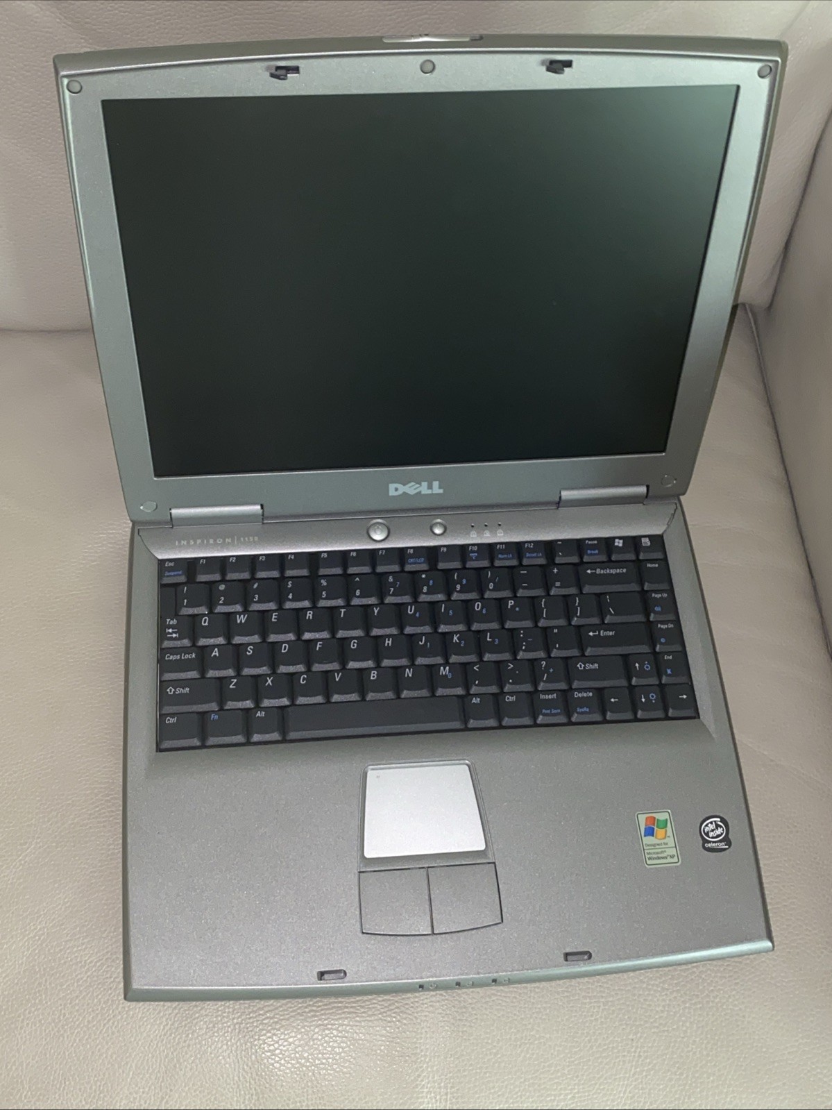 DELL INSPIRON 1150 LAPTOP — NEEDS A NEW BATTERY AND CHARGE – FOR PARTS ONLY