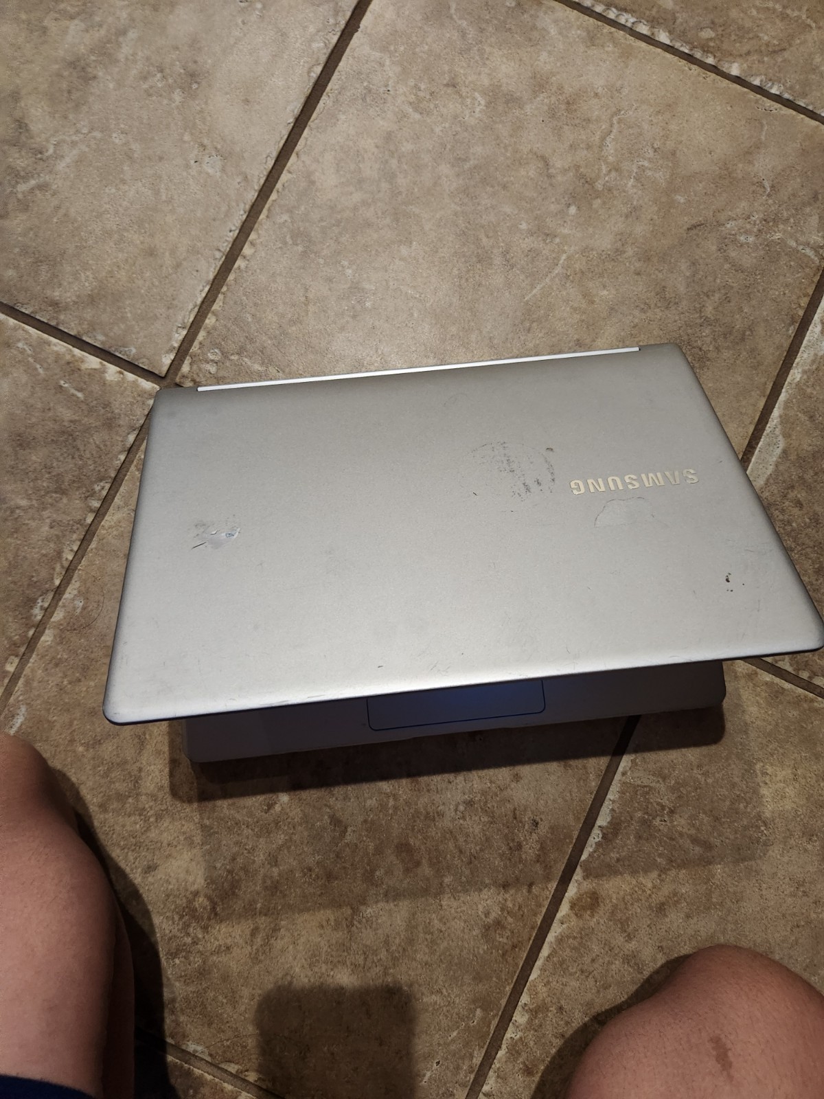 Silver Samsung Notebook 9 (used. many keys do not work) ( comes with charger)