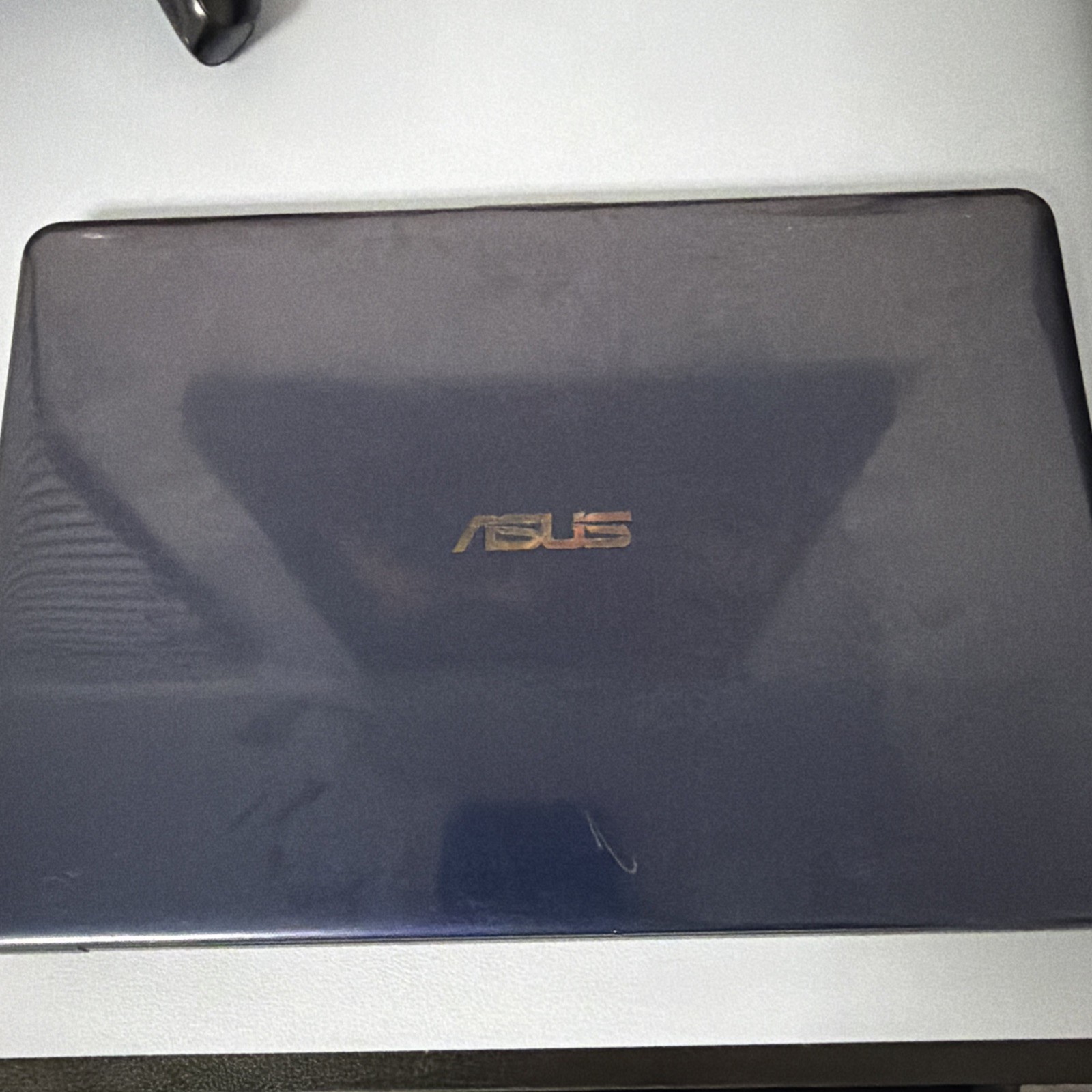 ASUS E203M Laptop, unkown condition needs charger never checked!
