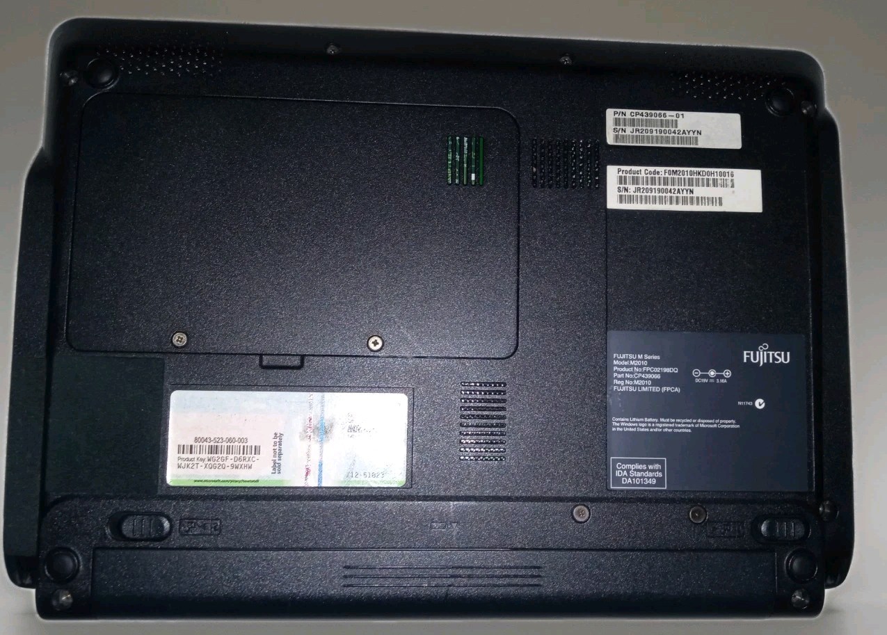 Fujitsu M2010 Series Purple Windows 7 Starter Netbook Laptop Computer