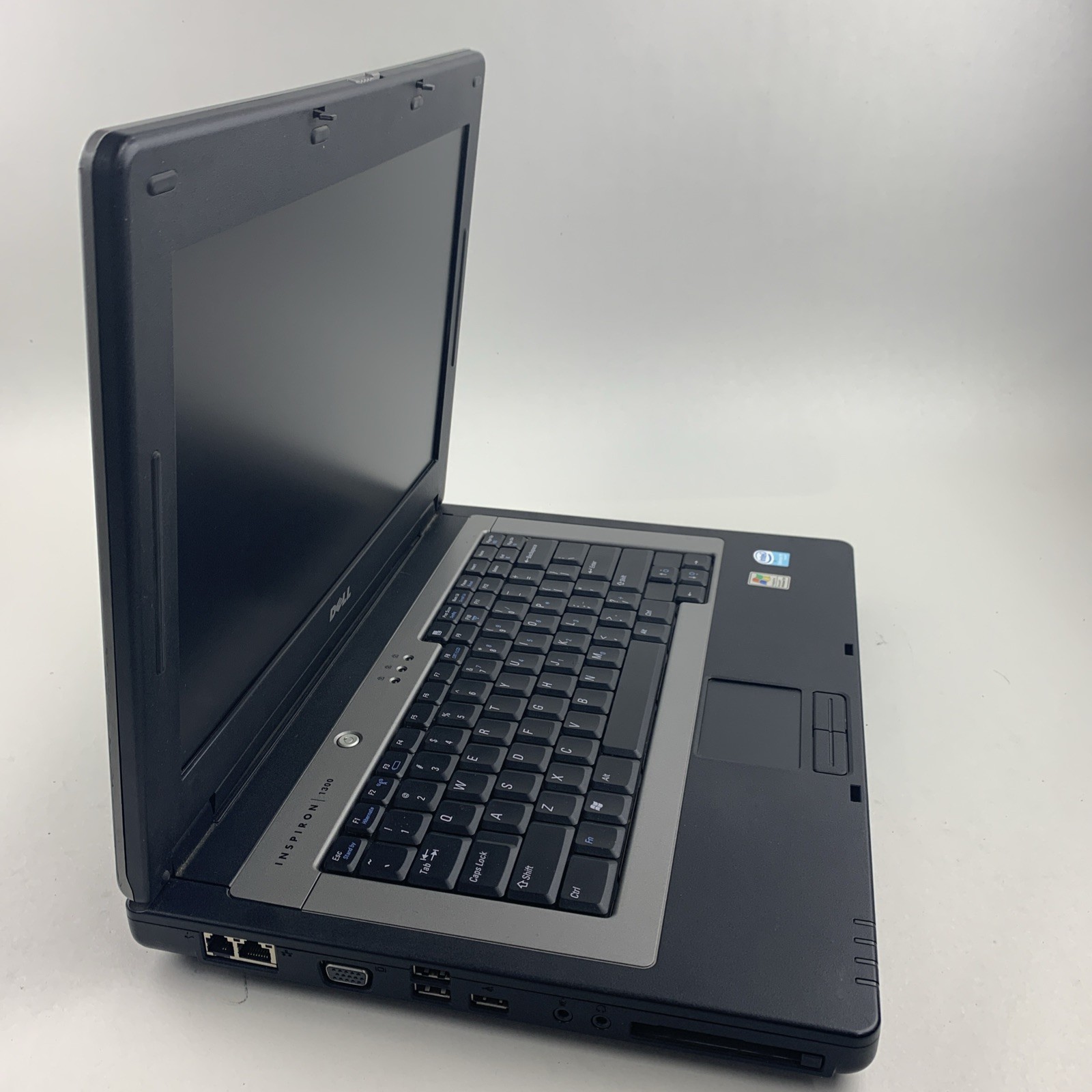 Dell Inspiron 1300 Intel Celeron M 1.40GHz 2GB RAM 14.1″ No Battery No HDD No OS