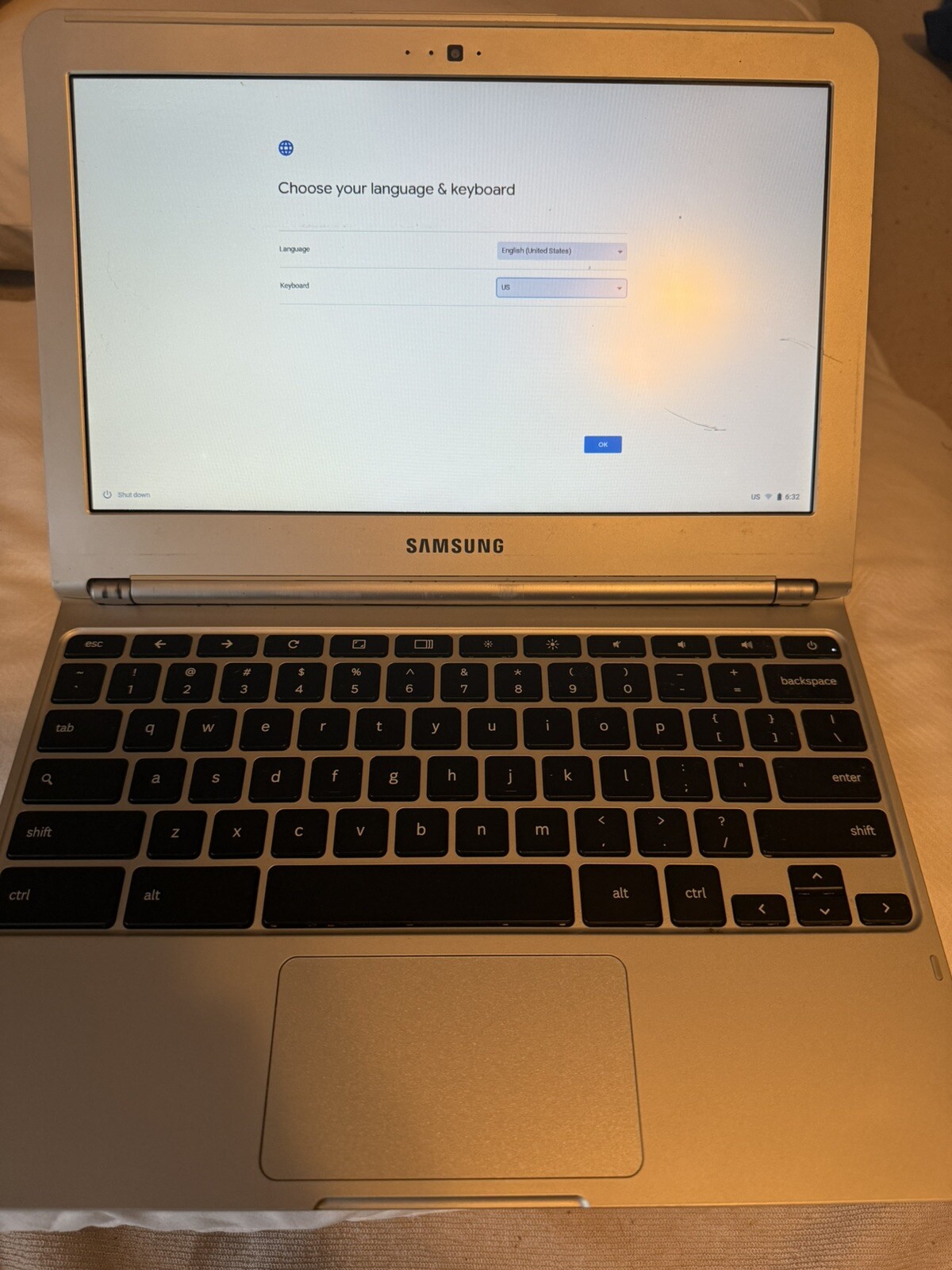 Samsung Chromebook Notebook 11.6” with Red Case Stand (XE303C12 Model).