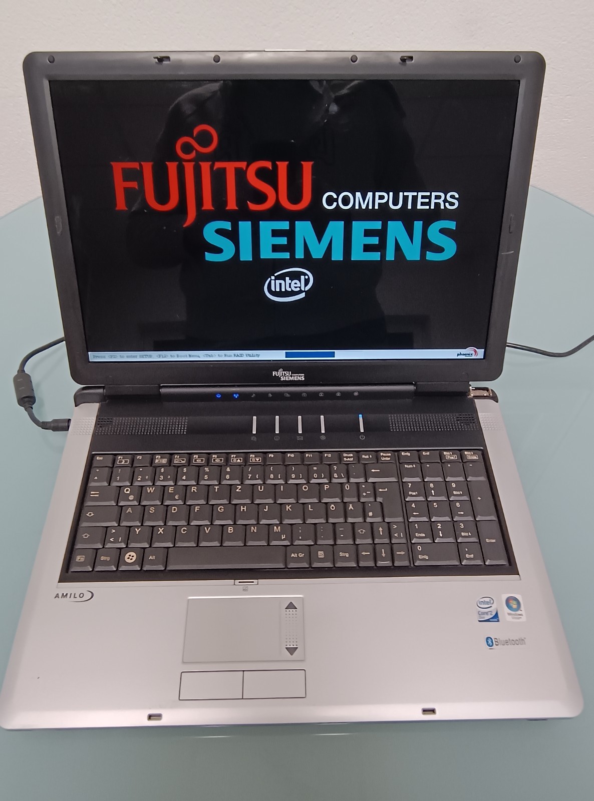 Notebook Fujitsu Siemens Amilo Xi 1554 with charging cable and ANTIX Linux