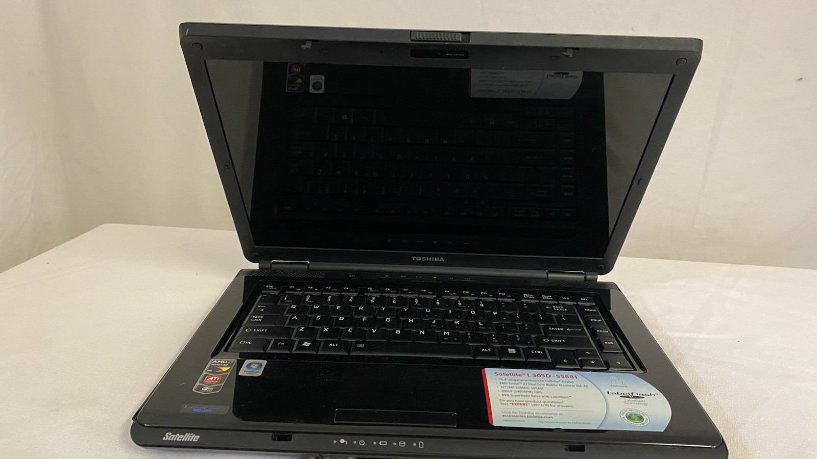 Toshiba Satellite L305D-S5934 AMD Turion X2 RM-70 2GHz 1 GB NO CHARGER. Works!