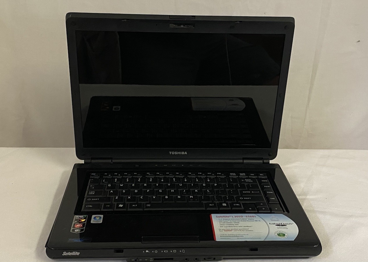 Toshiba Satellite L305D-S5934 AMD Turion X2 RM-70 2GHz 1 GB NO CHARGER. Works!