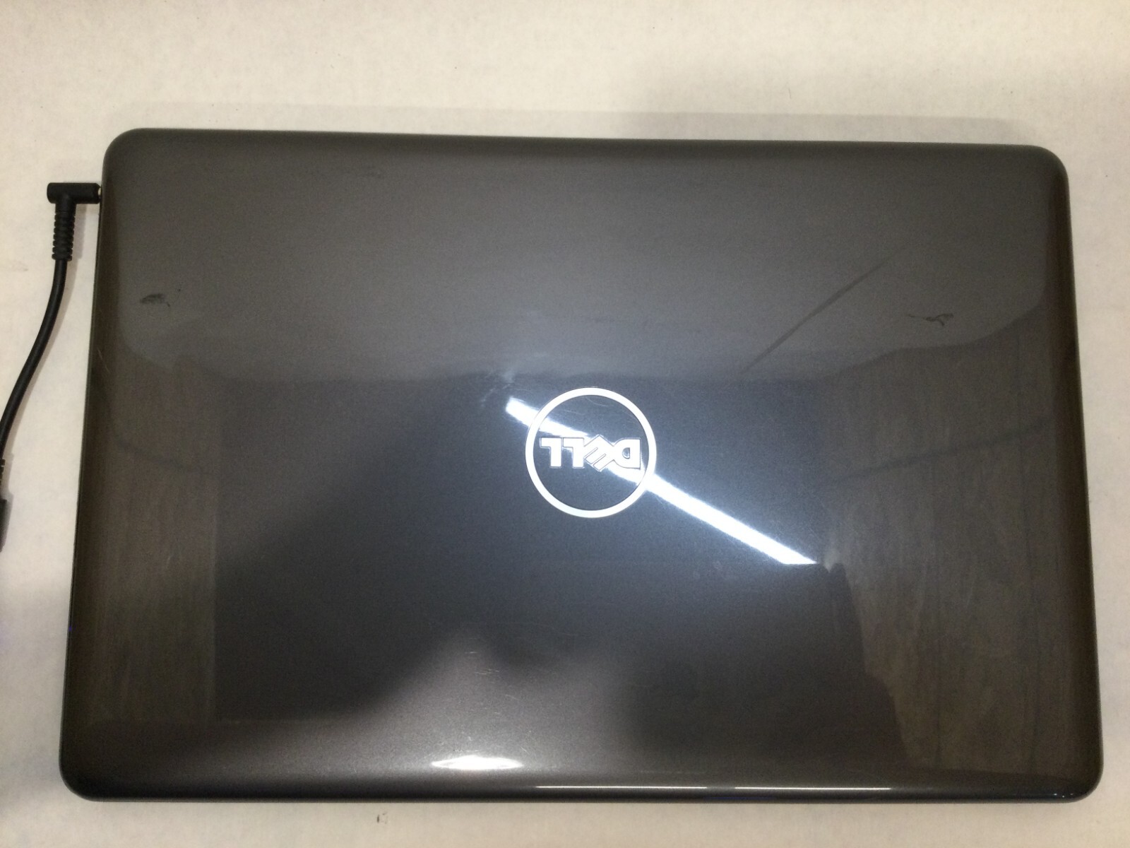 Dell Inspiron 5565 15.6” / UNKNOWN SPECIFICATIONS / (CRACKED/MISSING PARTS!) -MR