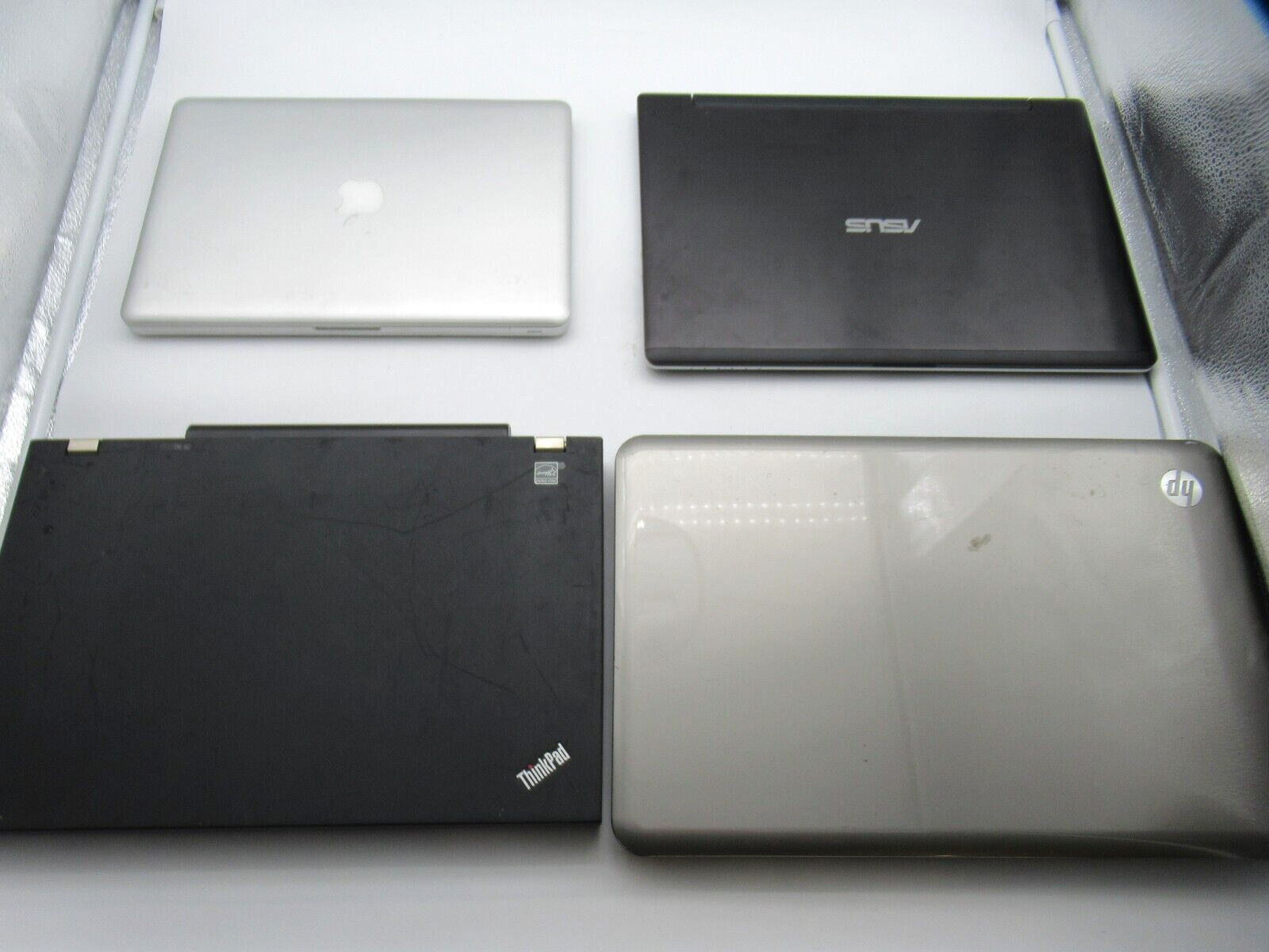 Lot of 4 Laptops, Apple Macbook Pro A1278, ASUS SonicMaster, ThinkPad T510, HPg7