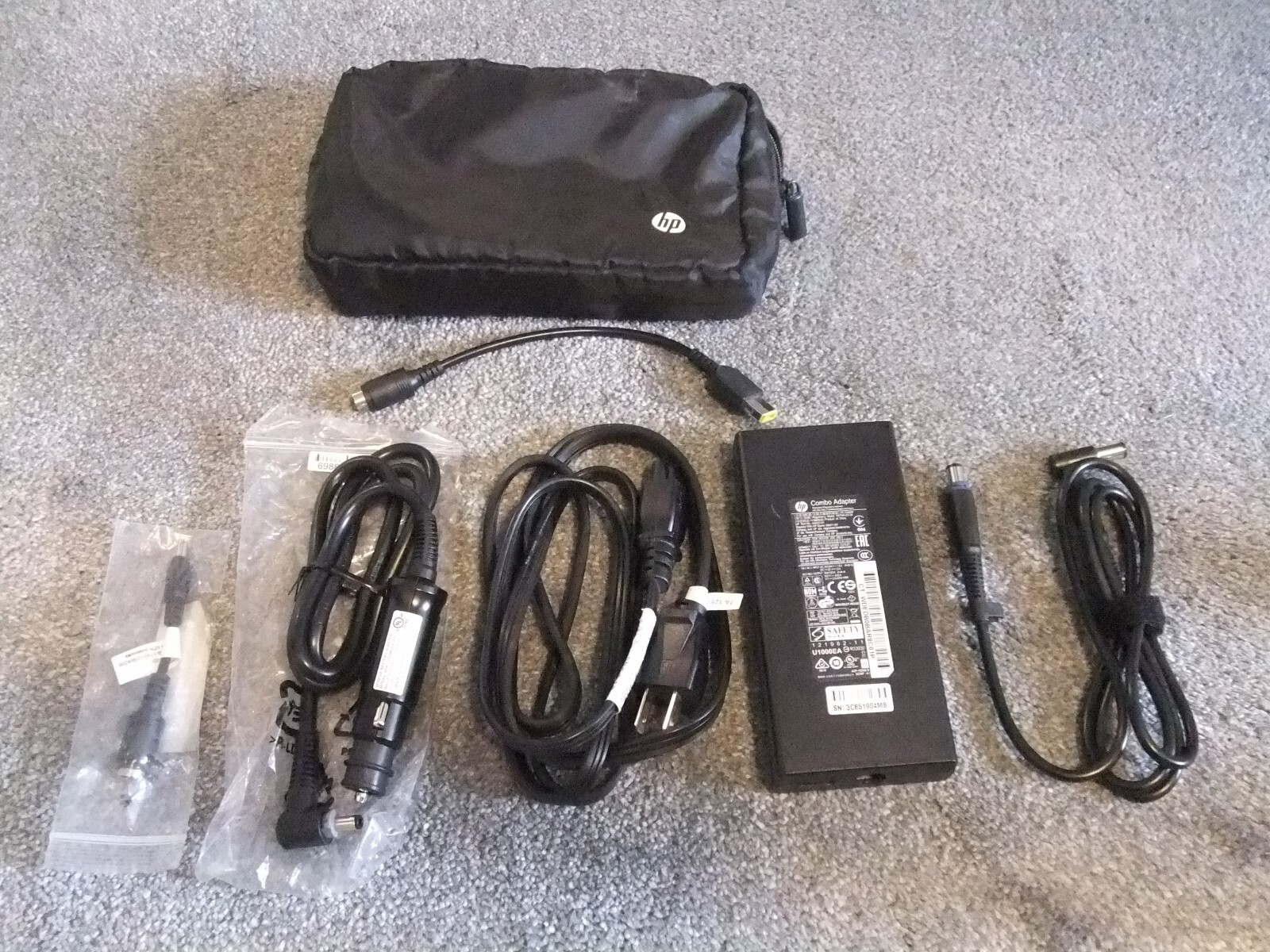 Genuine HP Combo 100W Notebook Power Supply – 120VAC and auto 12VDC + 3 adapters