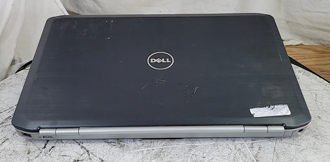 DELL LATITUDE E5520 Laptop Core I5-2520M 4GB 1TB SEE NOTES