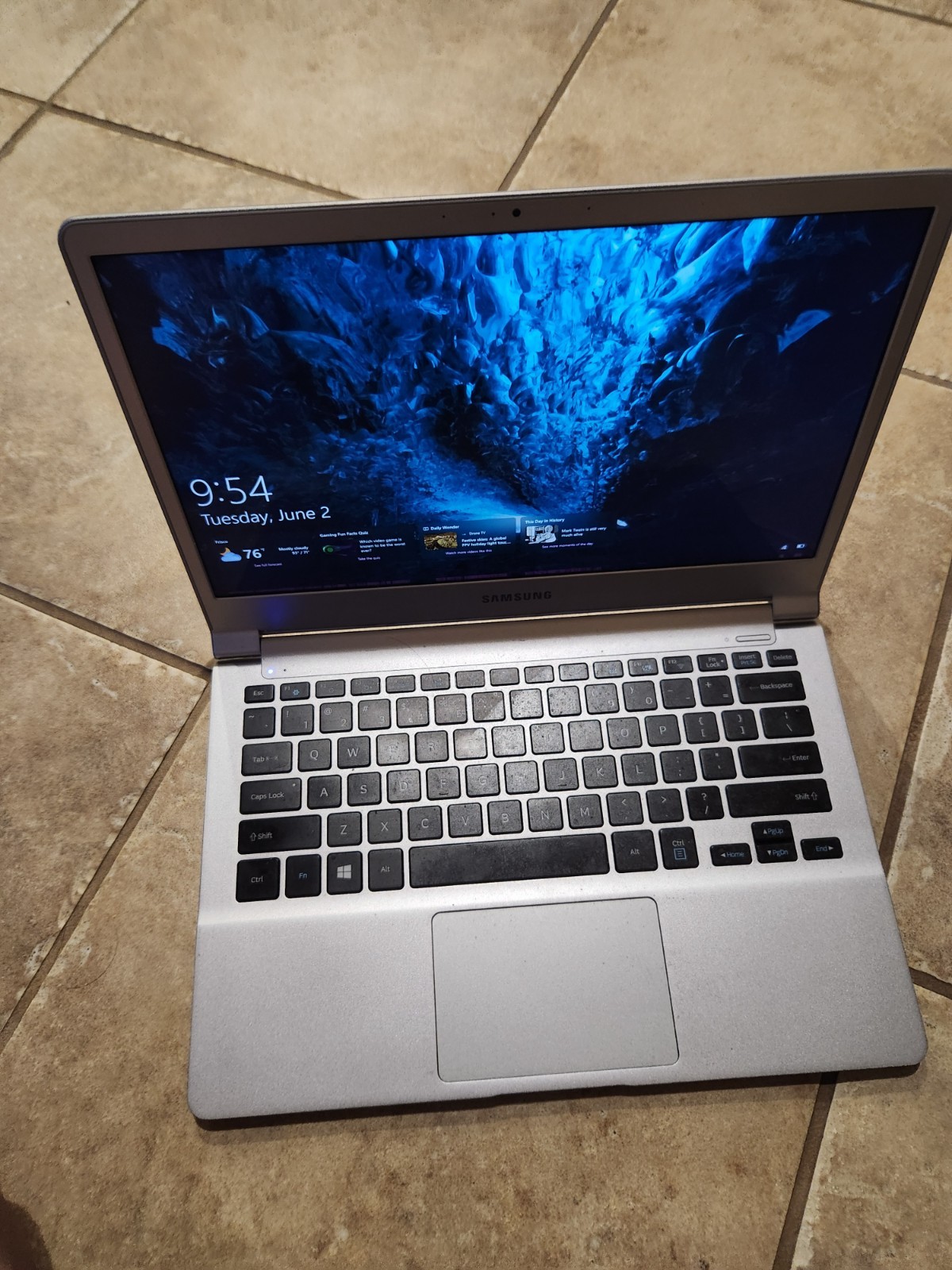 Silver Samsung Notebook 9 (used. many keys do not work) ( comes with charger)