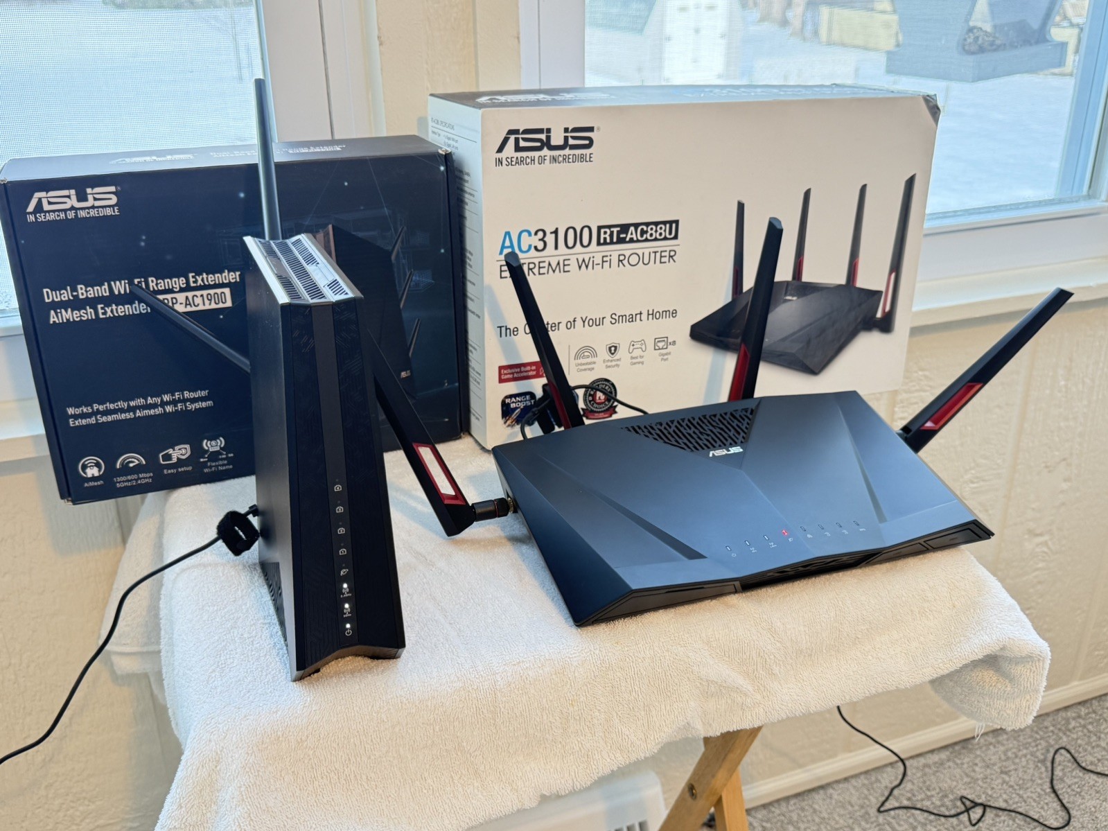 Asus RT-AC 88U WiFi Router/ Asus RP-AC 1900 WiFi Range Expander/ Motorola Modem