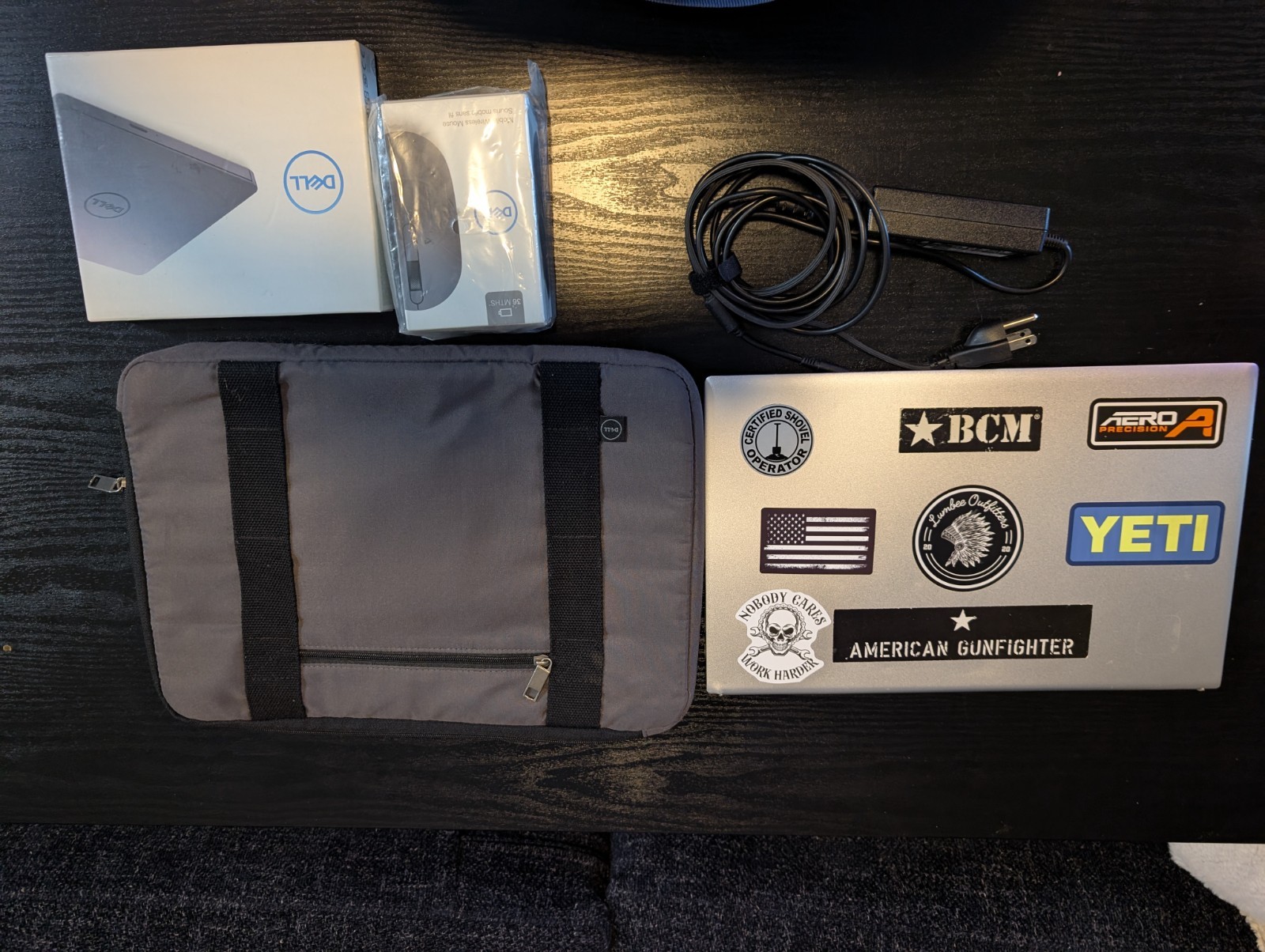 Dell Inspiron 15 5510 includes charger, external dvd drive, and wireless mouse