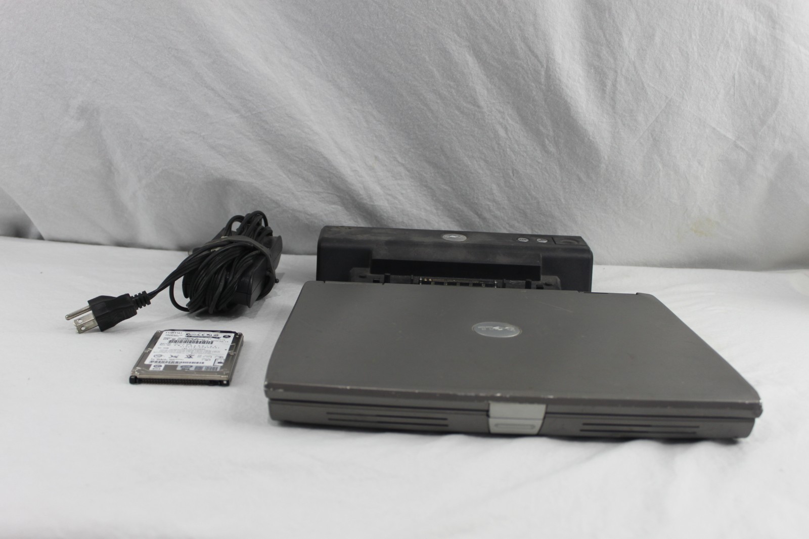 Dell Latitude D600 Laptop + Docking Station + Extra 60GB HDD – Tested Working