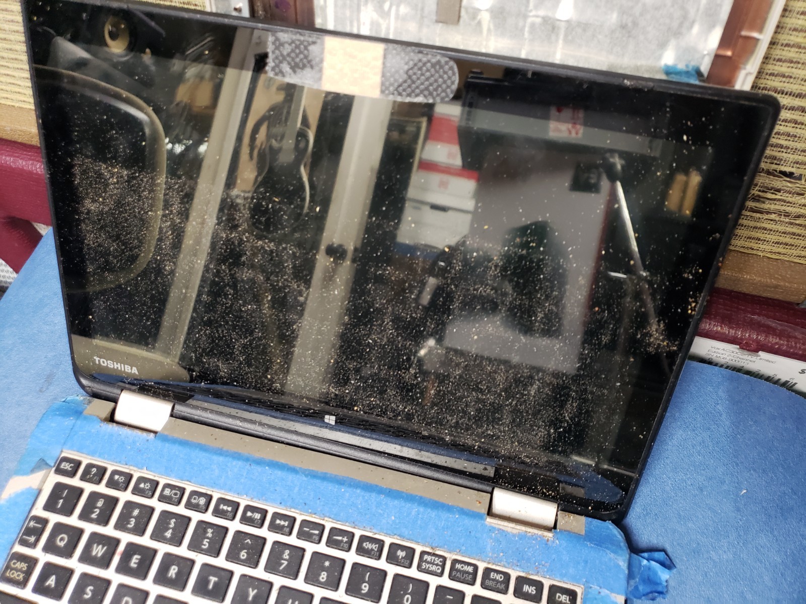 Toshiba Satellite Radius 11 L15W-B1302 Laptop damaged and dirty for parts