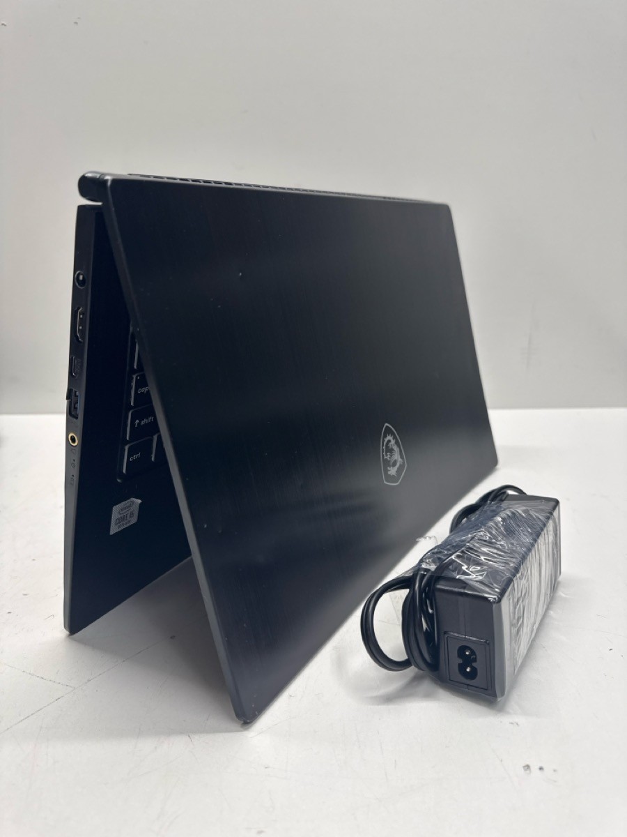 MSI COMPUTER MS-1551 WITH CHARGER (P05025054)