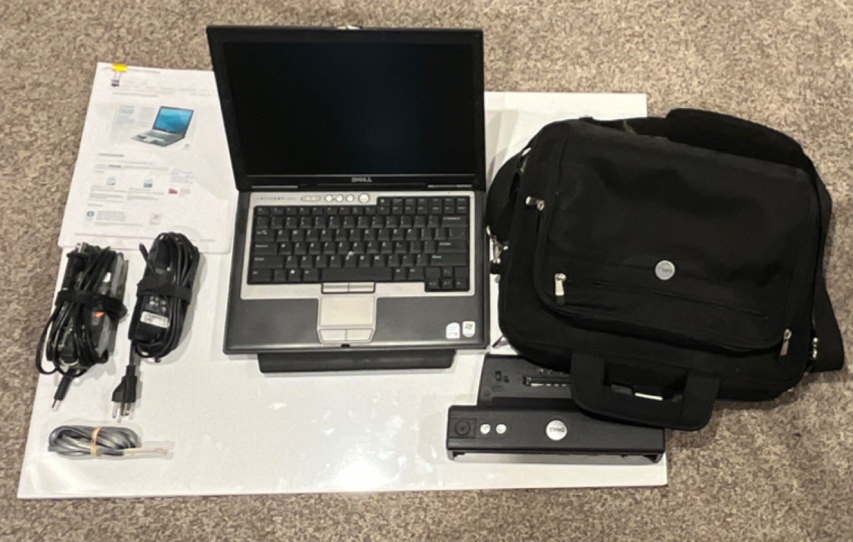Dell Latitude D620 Laptop with docking station and original papers ‘still runs’