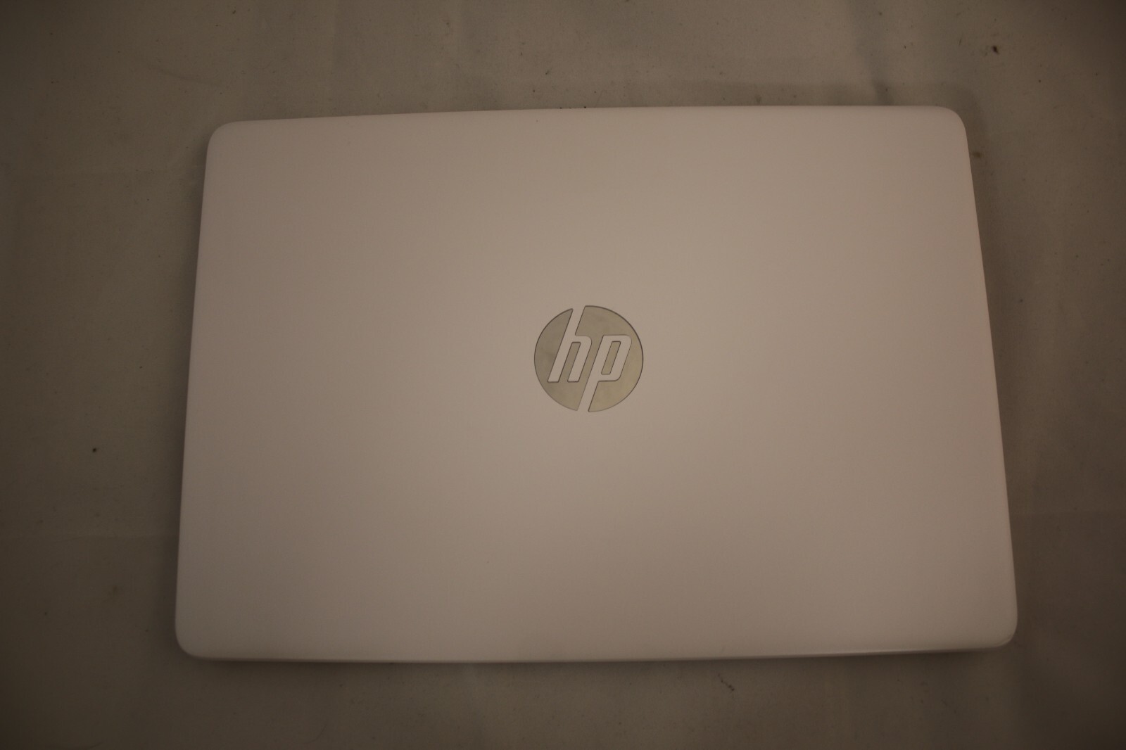 HP Laptop (snowflake) w/ charger (64 gb hard drive, 4 gb ram) 14-DQ0002DX