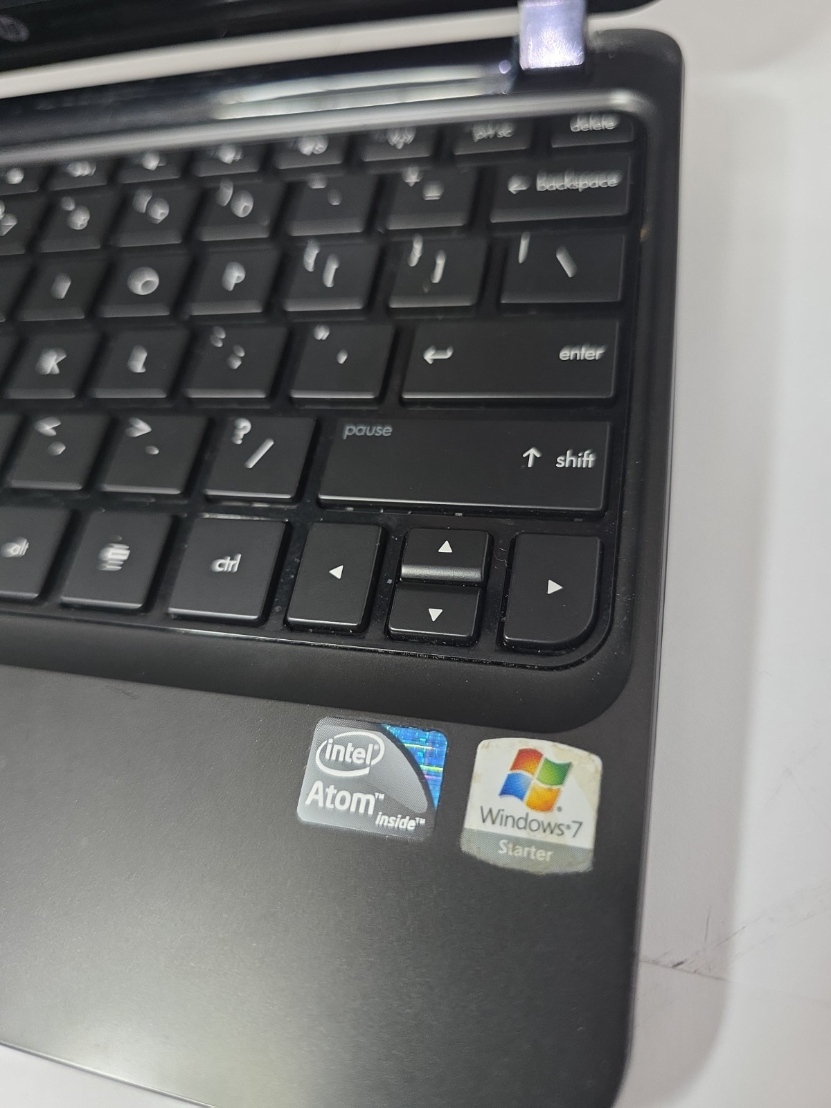 Functional HP Mini laptop. Has scratches and scuffs on screen. For Parts.