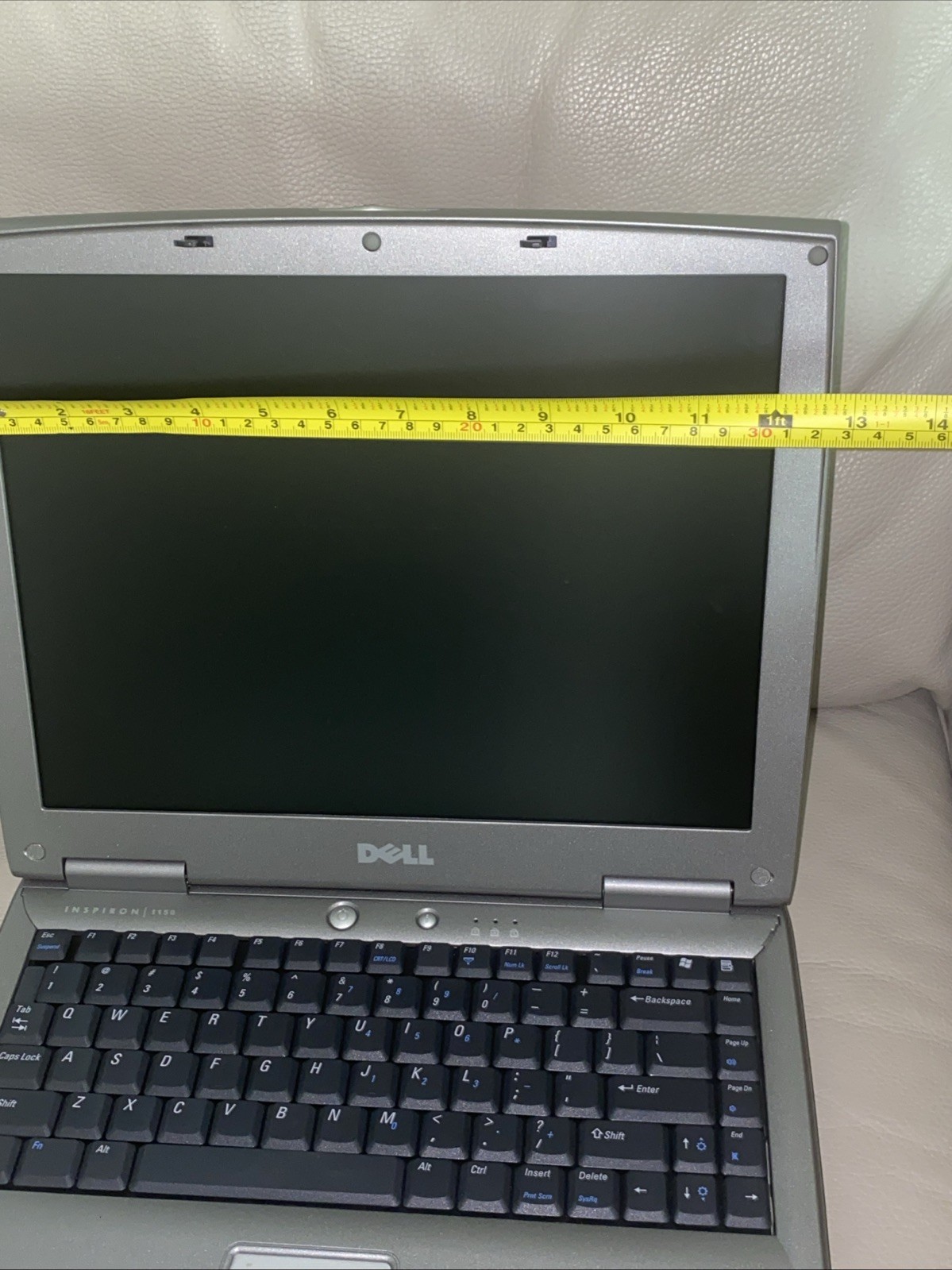 DELL INSPIRON 1150 LAPTOP — NEEDS A NEW BATTERY AND CHARGE – FOR PARTS ONLY
