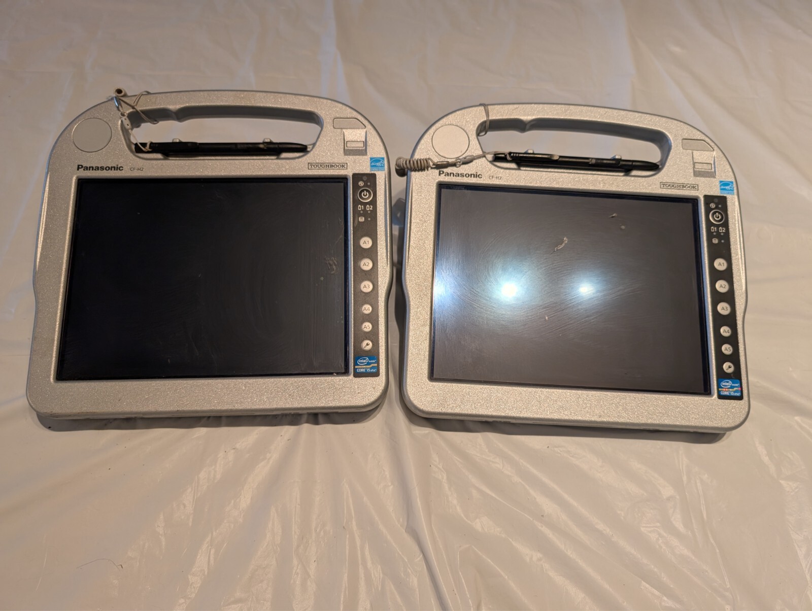 Lot Of 2 Panasonic CF-H2 With 1 Charger Stand ,Working (See Description)