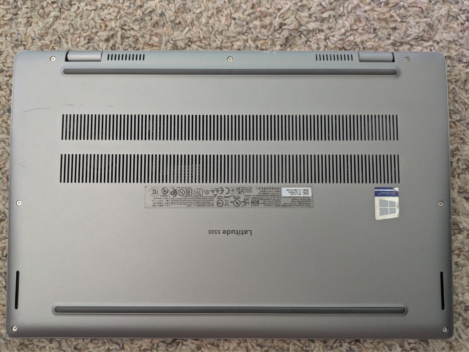 Windows Dell Latitude 3320 i5 from 2021. Sleek silver computer is great for work