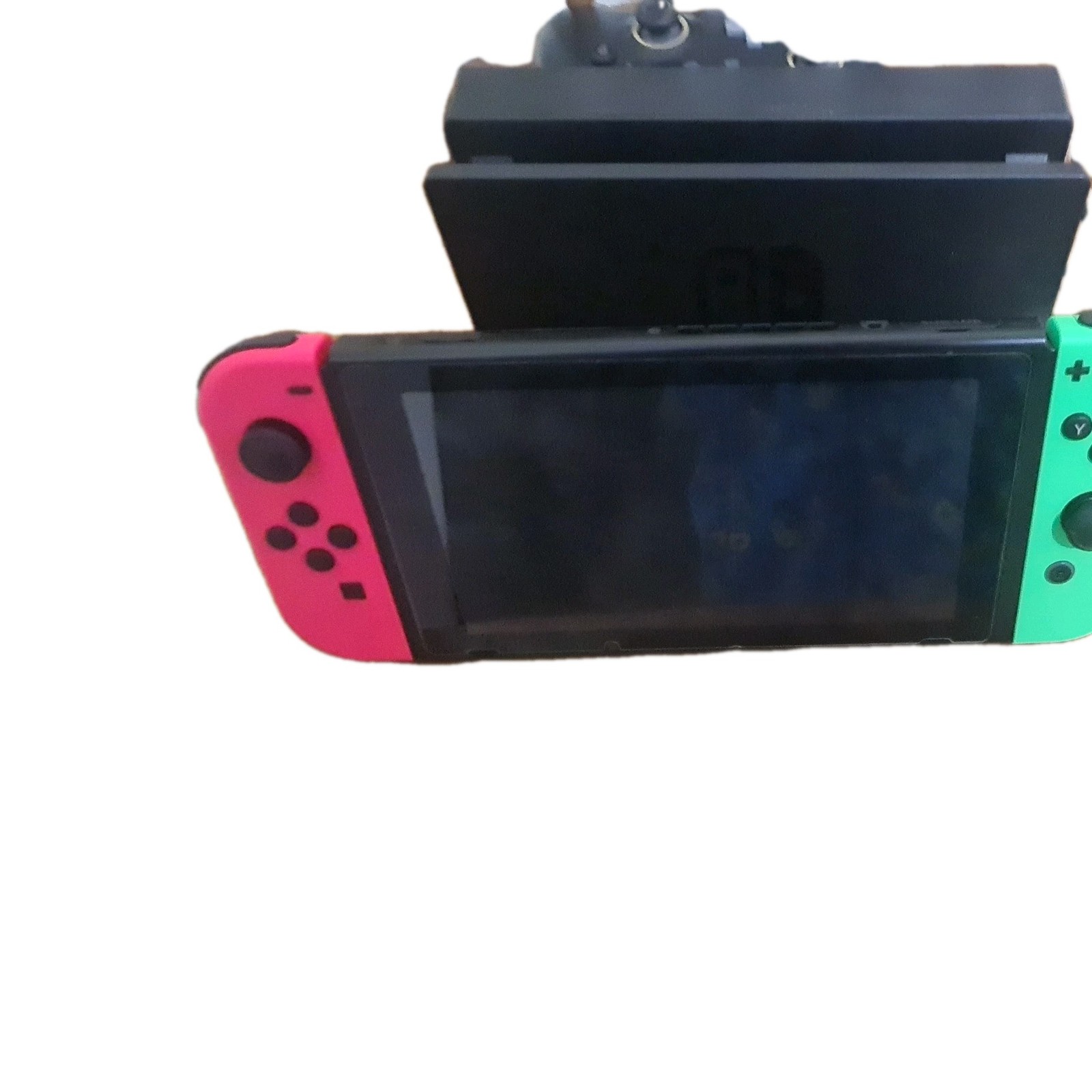 ASUS ROG Strix G G731GU And Nintendo Switch with joycons and one controller