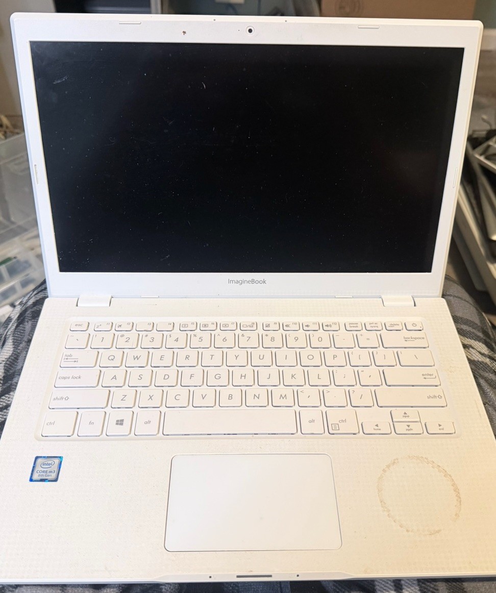 ASUS ImagineBook 14 MJ401TA | m3-8100Y | 4GB RAM | Unknown SSD