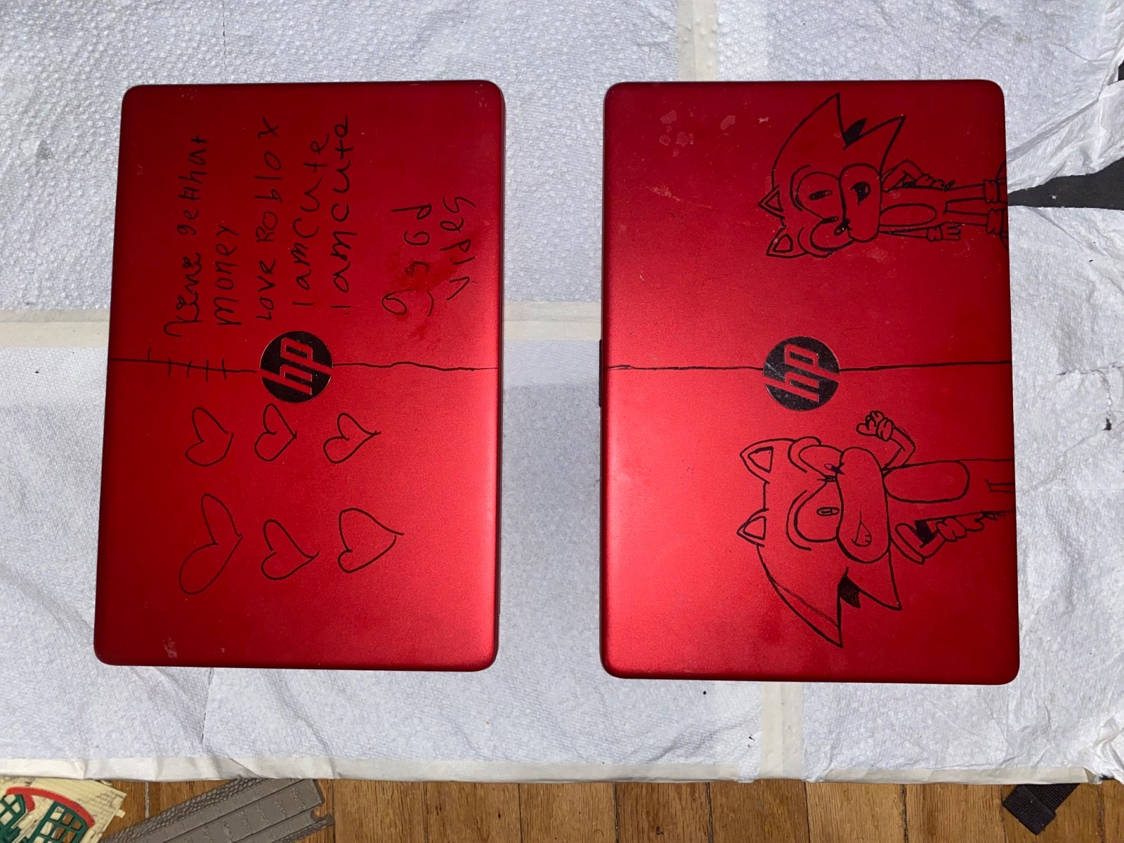2 Red HP Laptops (Selling For Parts)