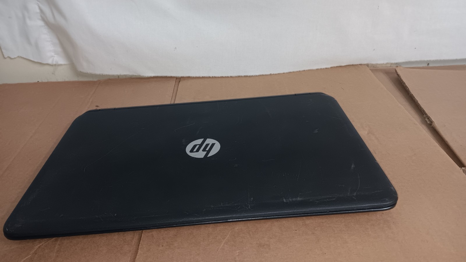 HP 15-F004dx Laptop AMD E1-2100 @ 1.0 GHz 15.6″ LCD screen, 500 GB HD For Parts