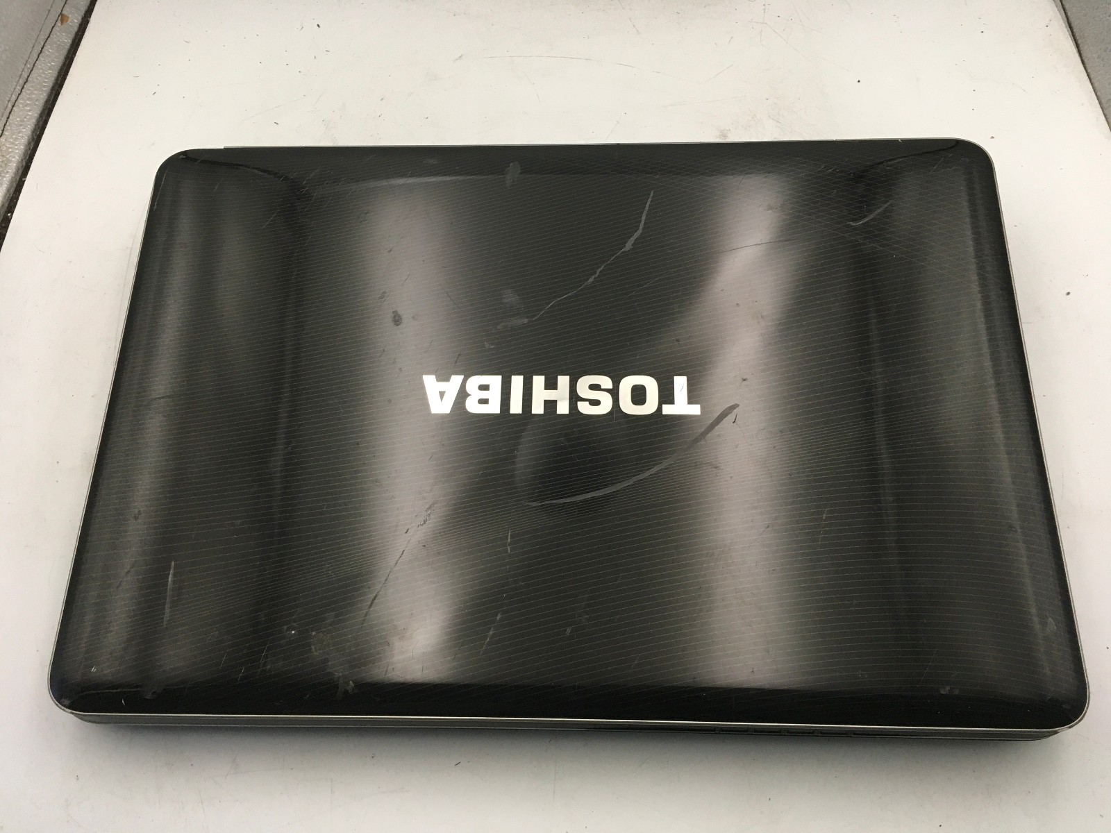 TOSHIBA SATELLITE A505 S6980 – BOOTS TO BIOS – INTEL 2 DUO T6600 – 512MB RAM -BB