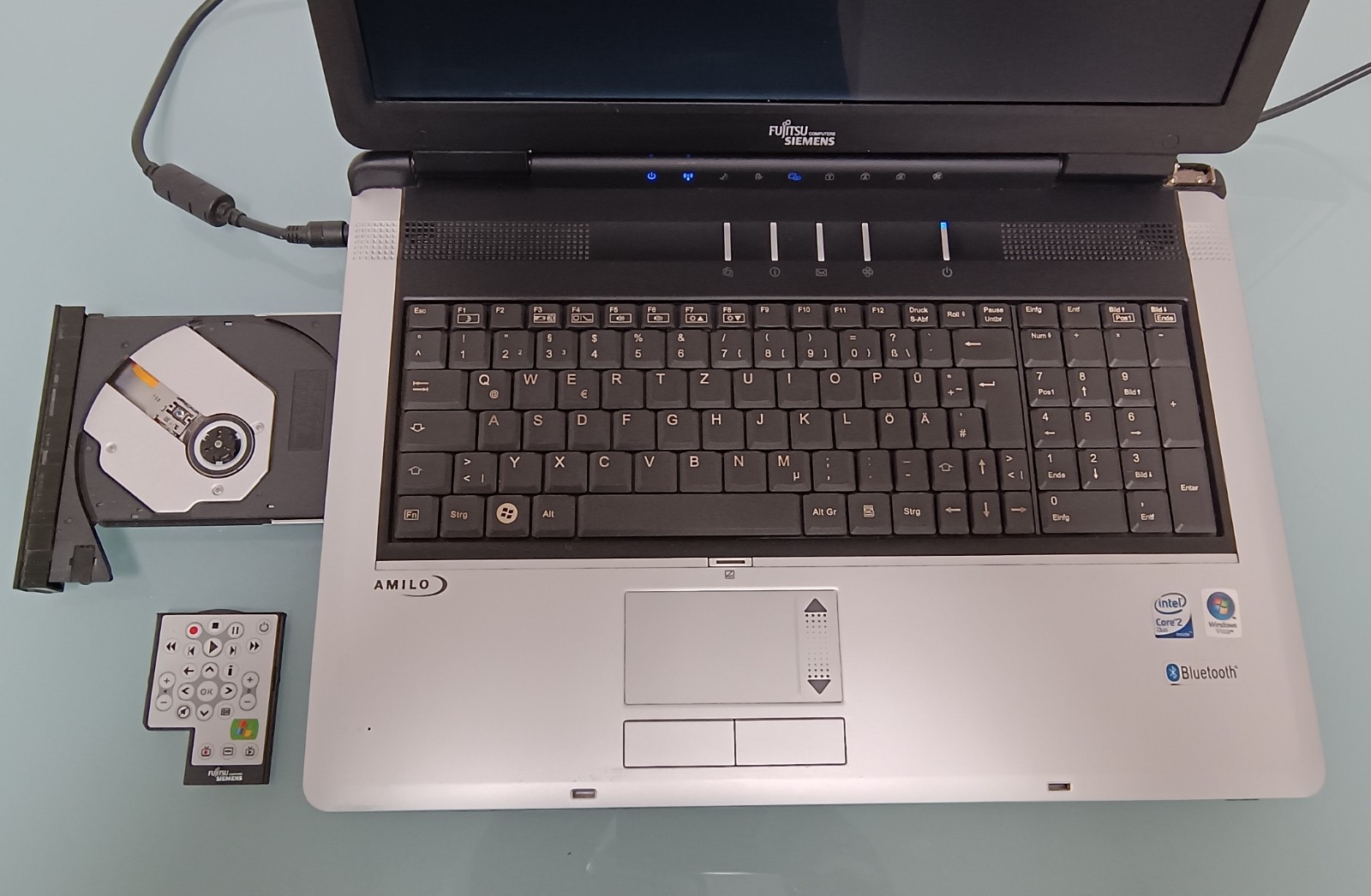 Notebook Fujitsu Siemens Amilo Xi 1554 with charging cable and ANTIX Linux