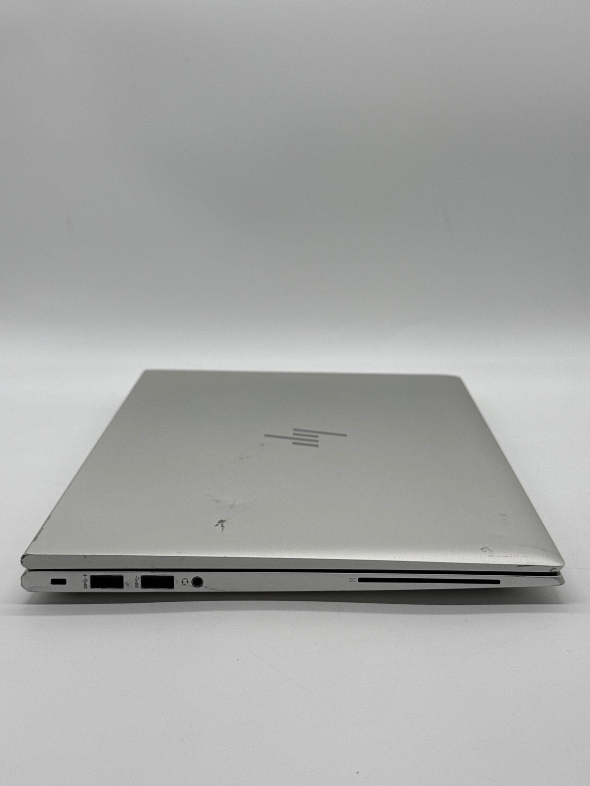 HP EliteBook 845 G7 14″ Ryzen 5 Pro 4650U 16GB RAM 256GB SSD Silver w/ Charger