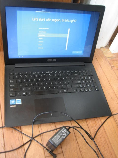 ASUS WINDOW 10 LAPTOP AND 4 GB RAM WITH POWER CHARGER MODEL NUMBER X553S