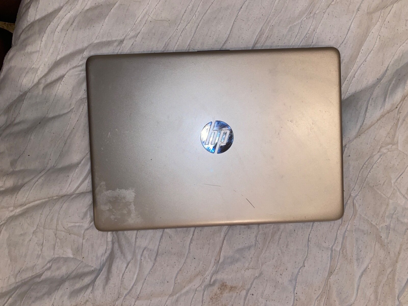 Gently used HP 14″ Laptop in Pale Gold