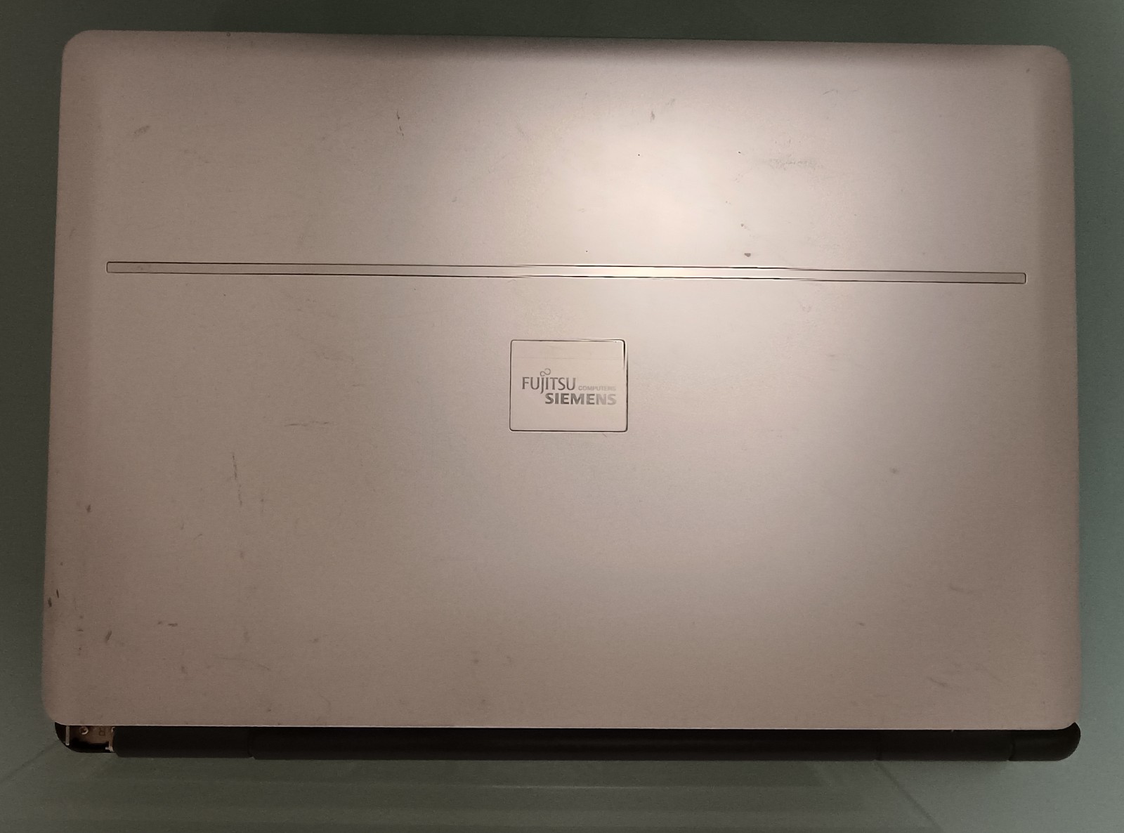 Notebook Fujitsu Siemens Amilo Xi 1554 with charging cable and ANTIX Linux